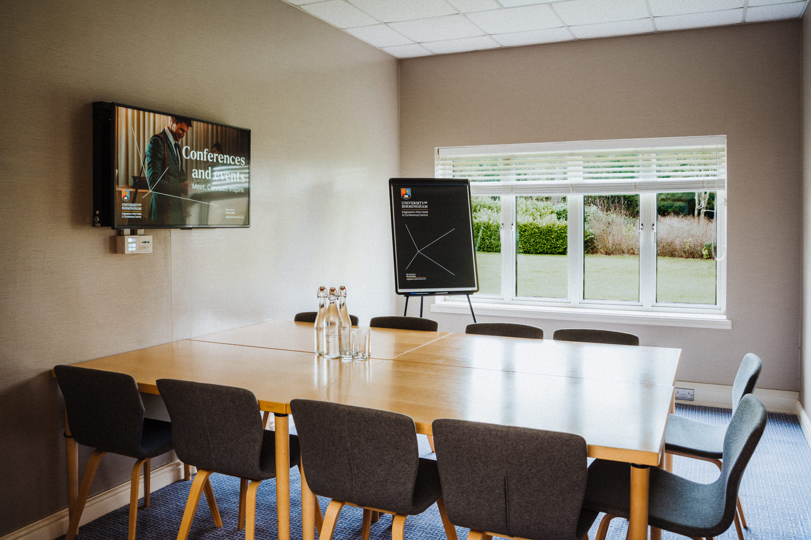 Meeting room at Edgbaston Park Hotel with large table, ideal for conferences and events.