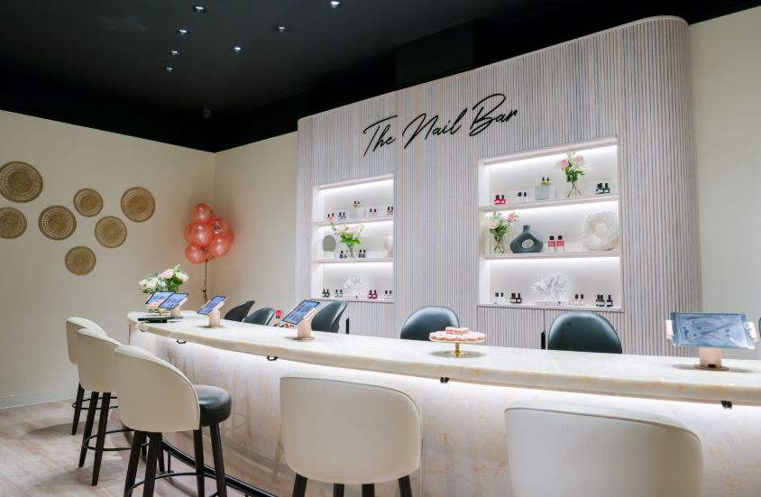 Townhouse Birmingham salon: neutral, bar-style seating for brand launches and luxury events.