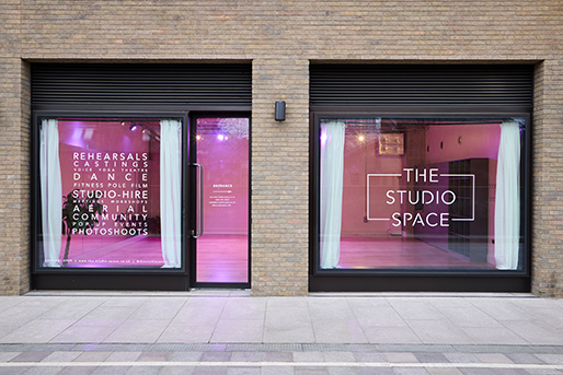 Modern Studio 1 venue with large windows for rehearsals and events at The Studio Space.