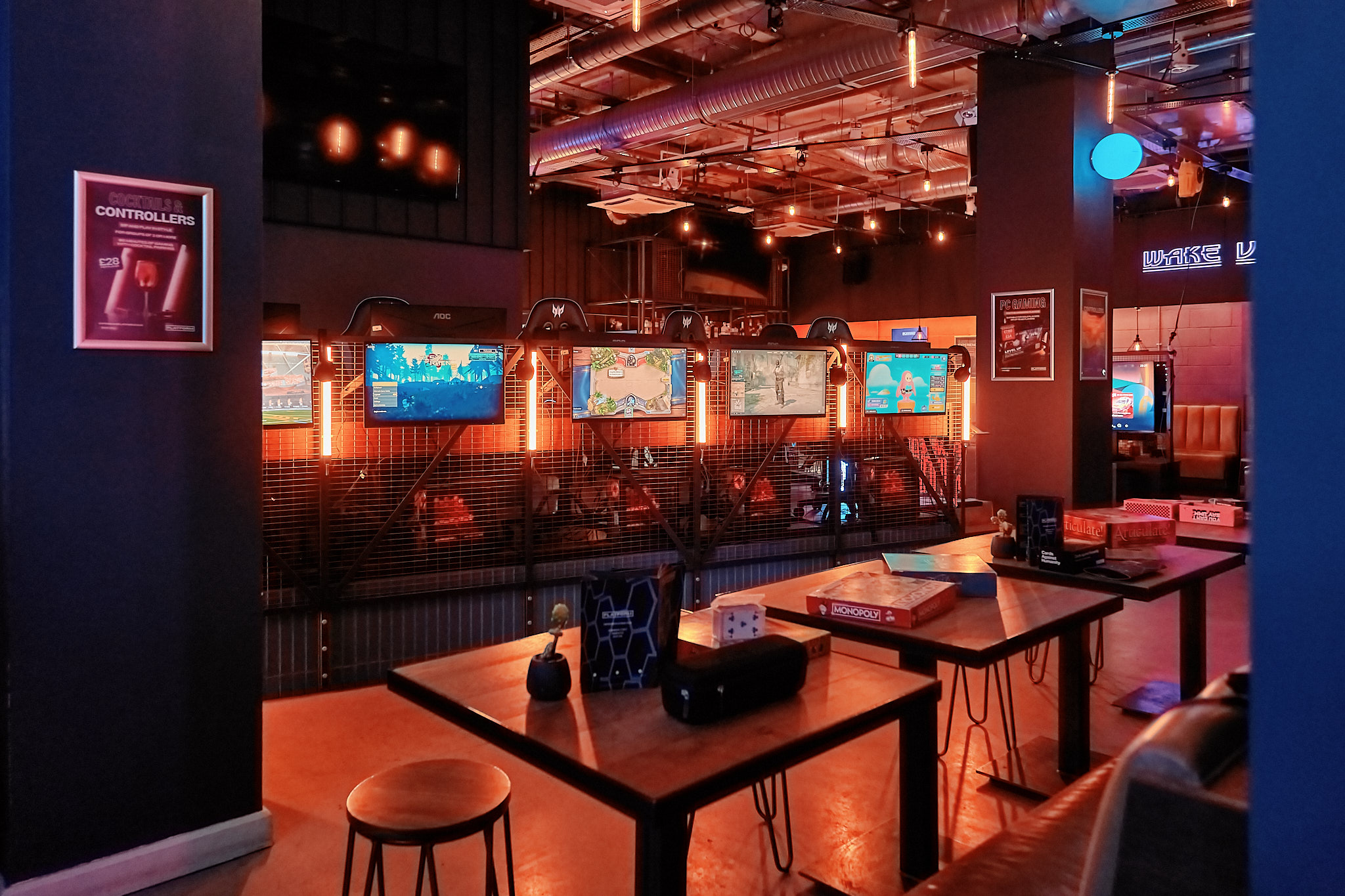 Modern event venue with vibrant lighting for networking and casual gatherings.