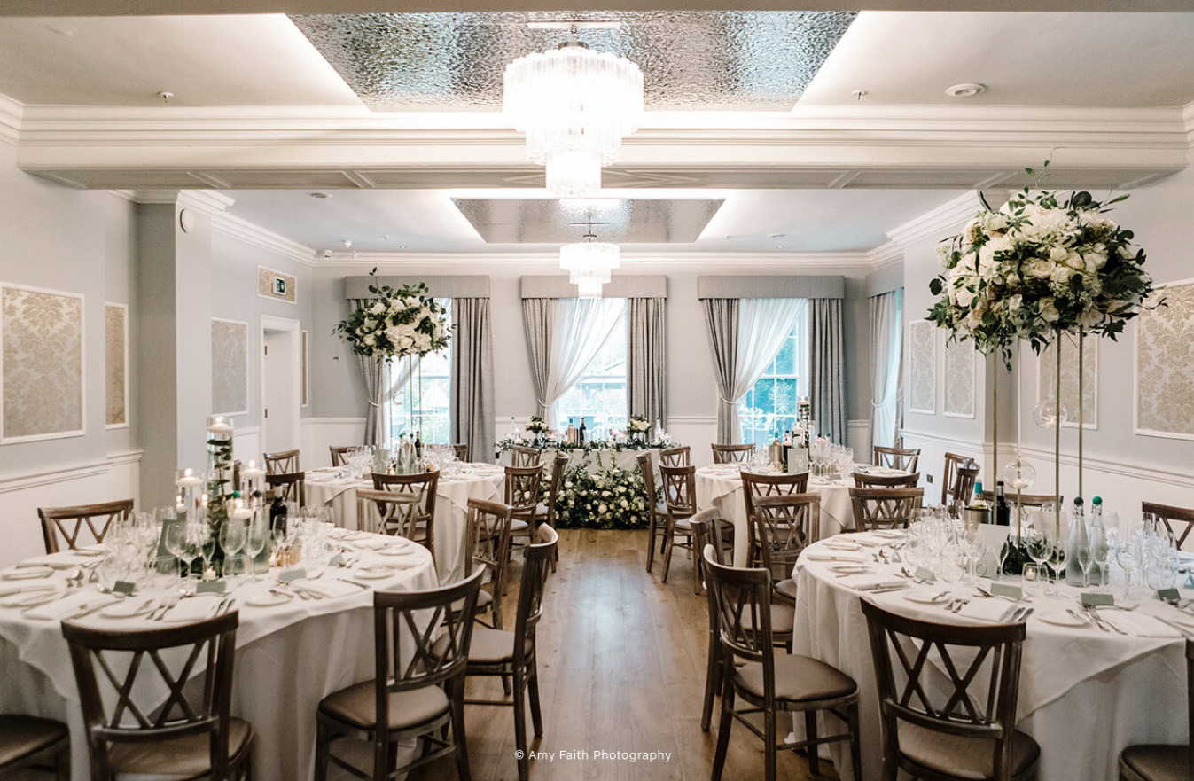 Elegant wedding venue at Old Palace Chester with refined floral centerpieces.
