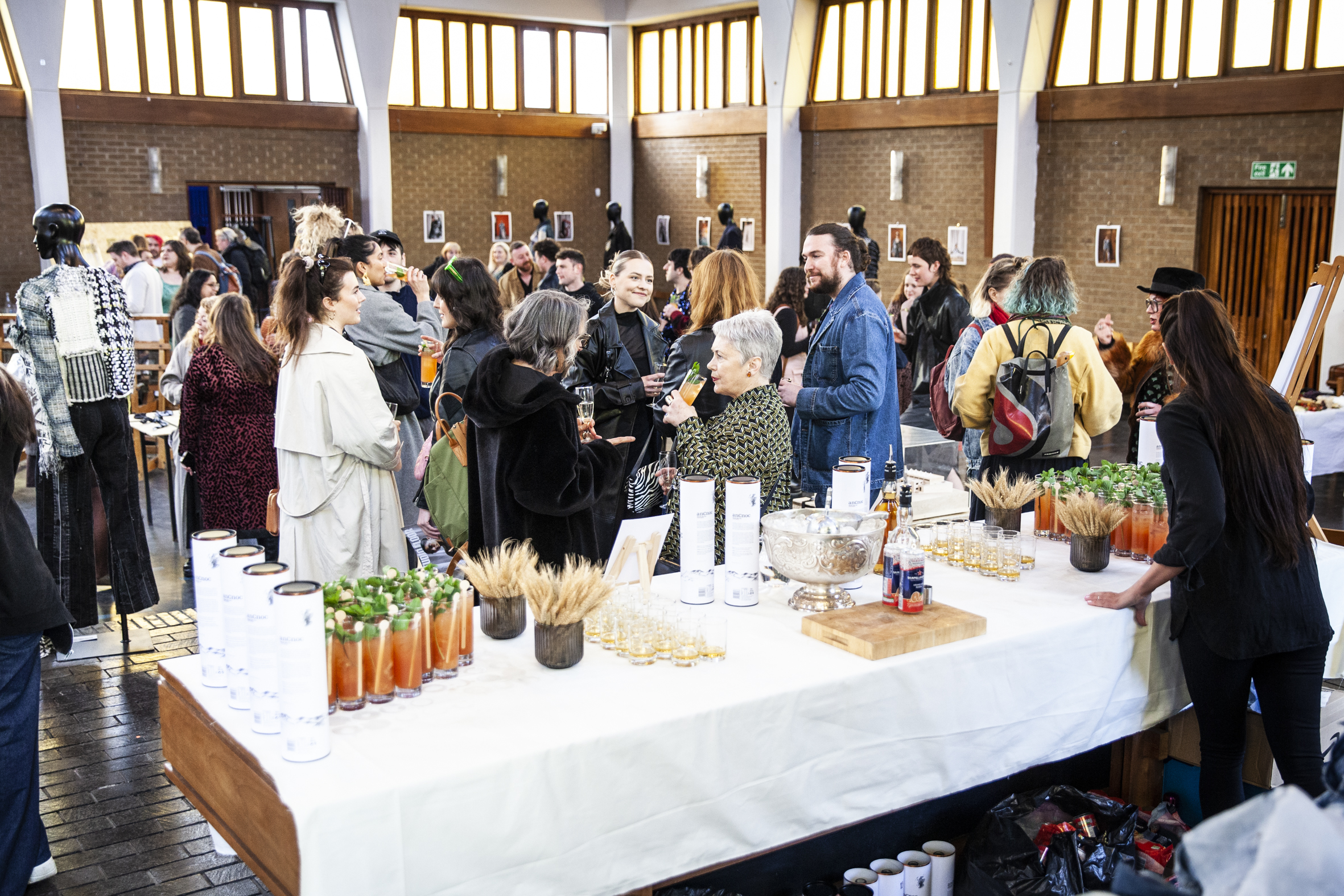 Pyramid Hall networking event with elegant decor and refreshments, promoting engagement.