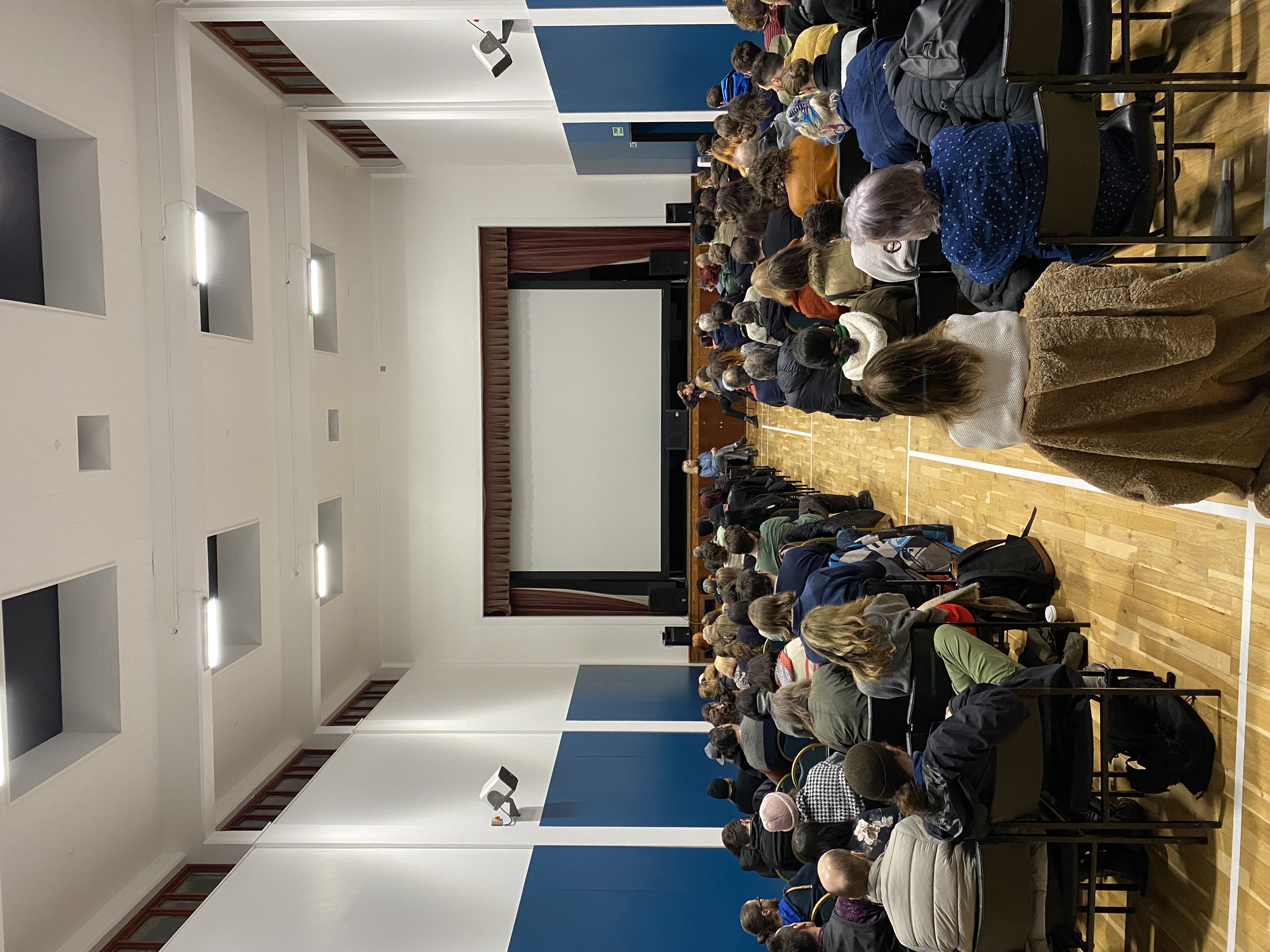 "Sports Hall seminar with engaged audience in The Pyramid at Anderston, ideal for workshops."