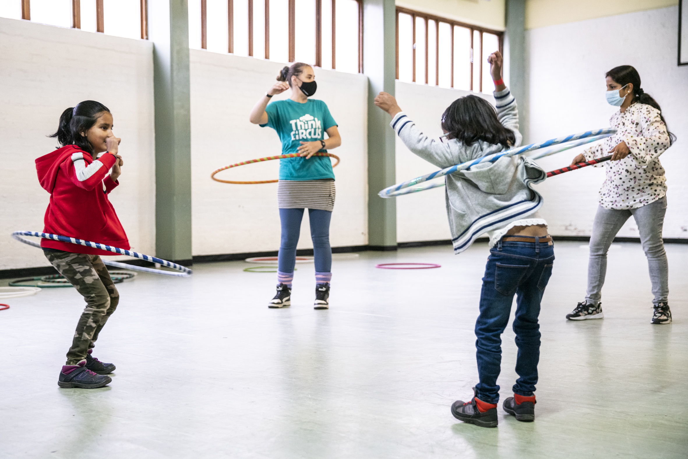 Interactive children's event in Lower Hall, featuring hula hoops for active fun.