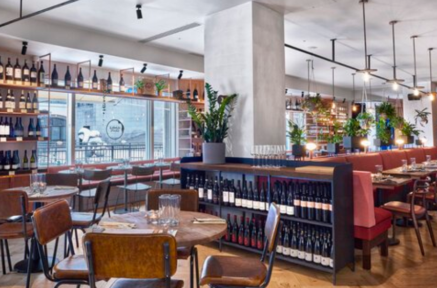 Private dining room at Humble Grape Canary Wharf for corporate events and networking dinners.
