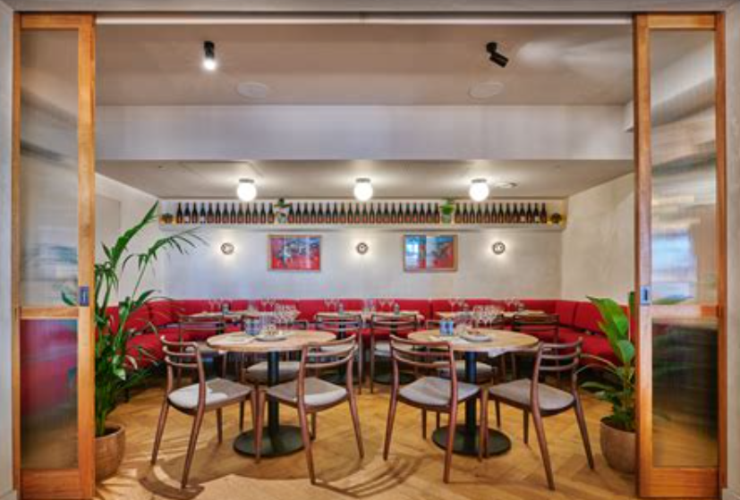 Private dining room at Humble Grape Canary Wharf for team dinners and corporate networking events.