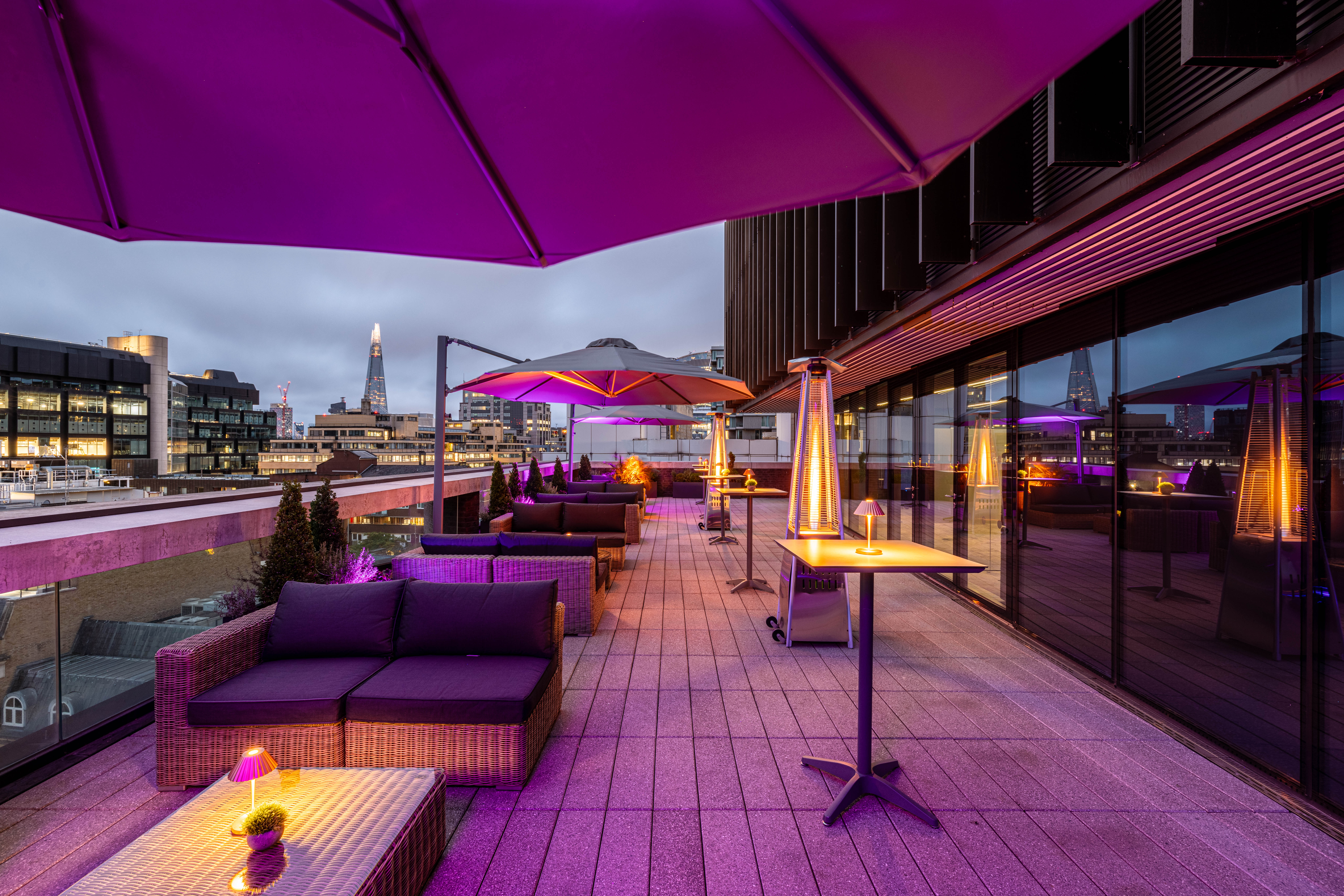 Stylish rooftop venue with city views for summer parties and networking events.