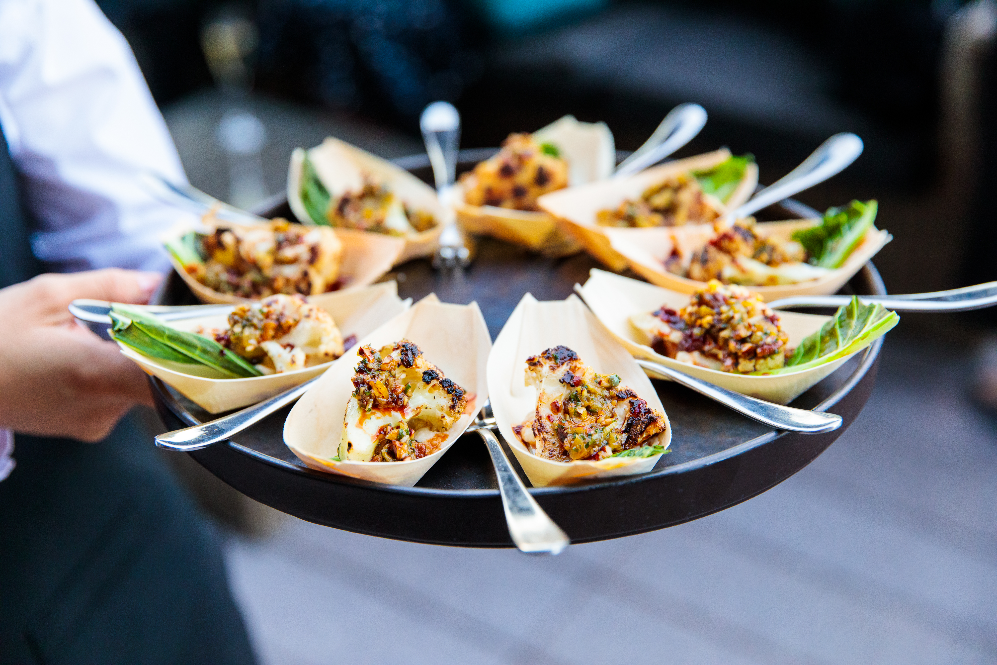 Gourmet hors d'oeuvres on spoons at Summer Party Rooftop event, perfect for upscale gatherings.
