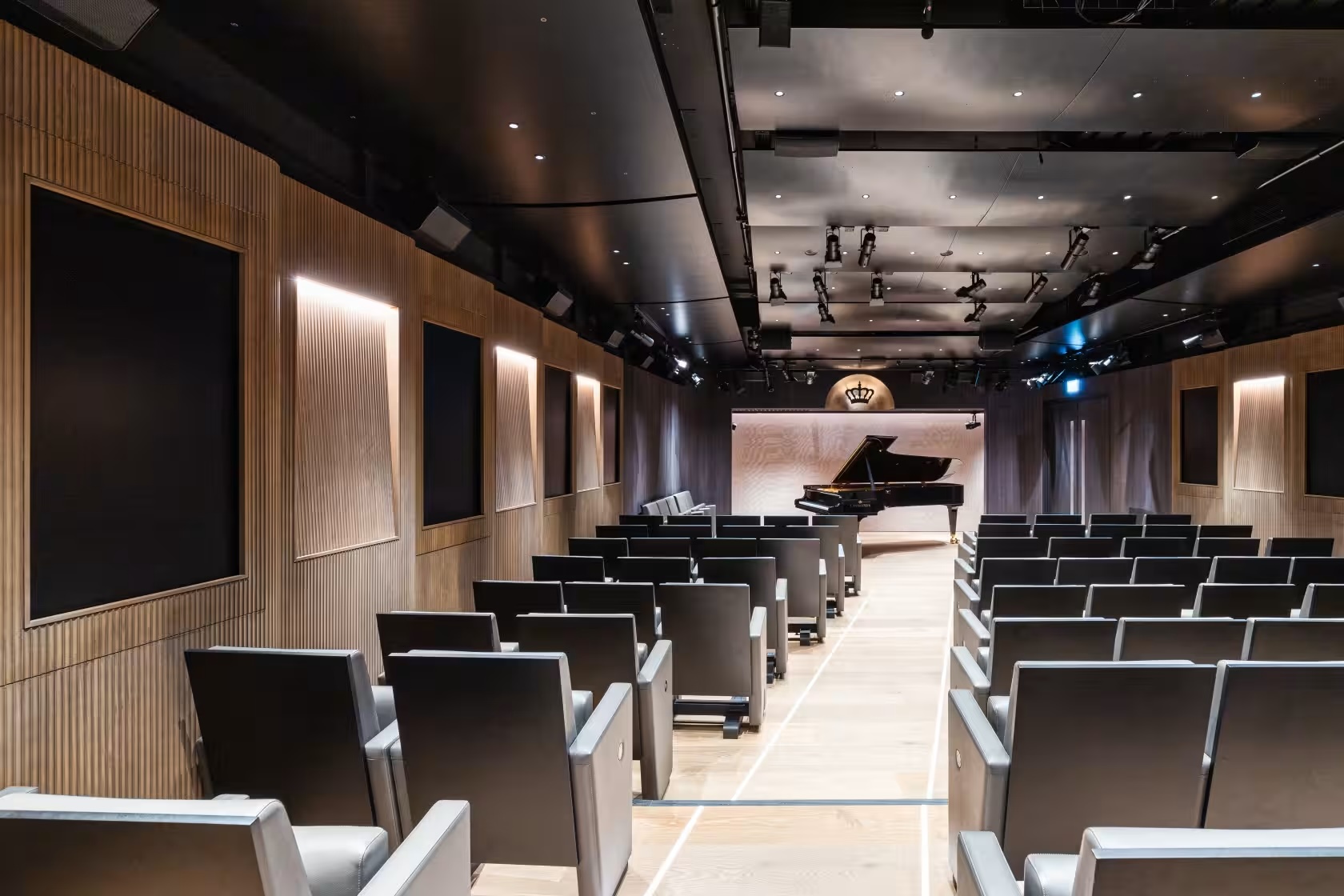 Modern event space in Bechstein Hall with grand piano for corporate meetings and performances.
