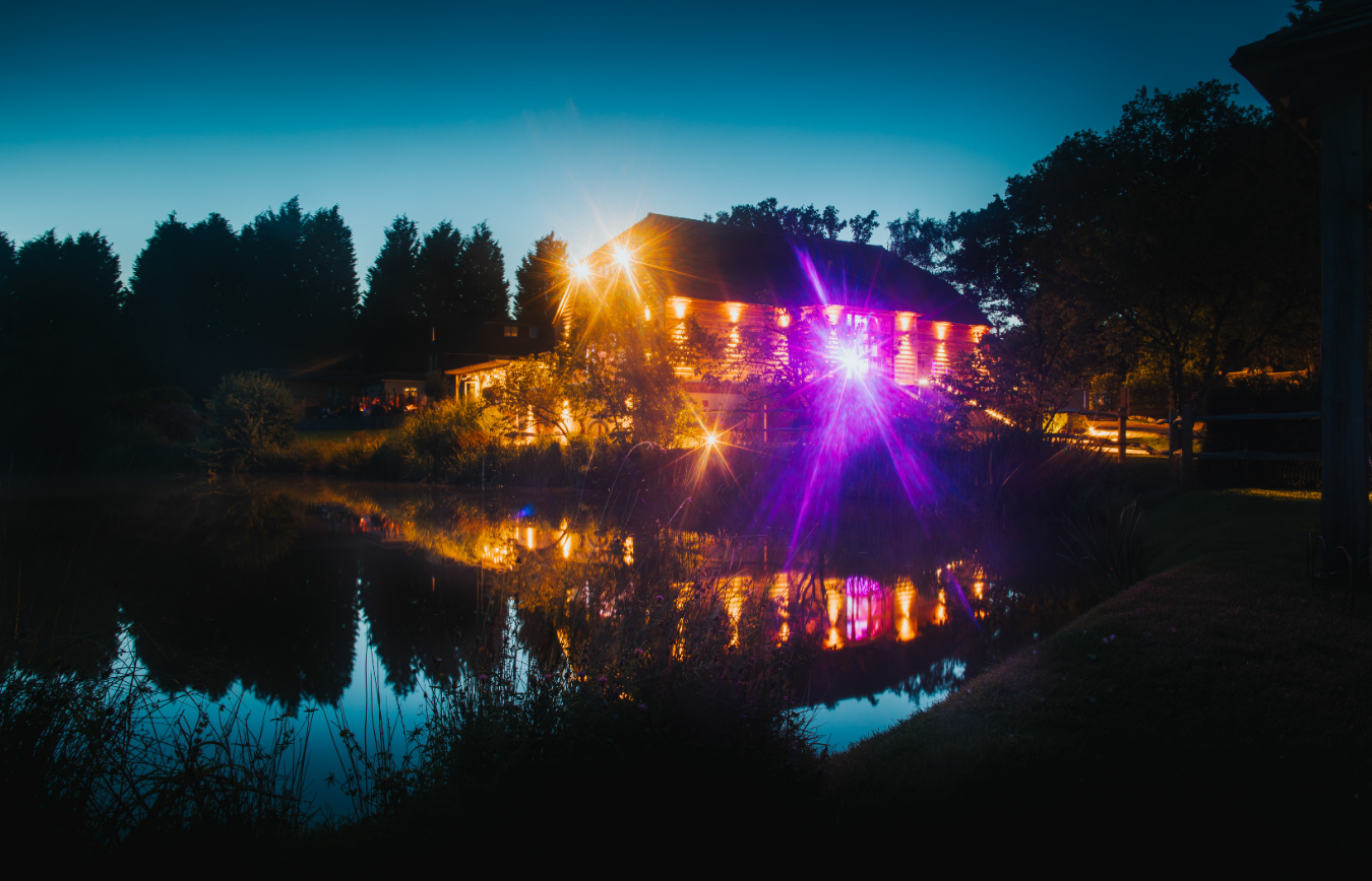 Charming Brookfield Barn by tranquil lake, perfect for summer receptions and intimate gatherings.