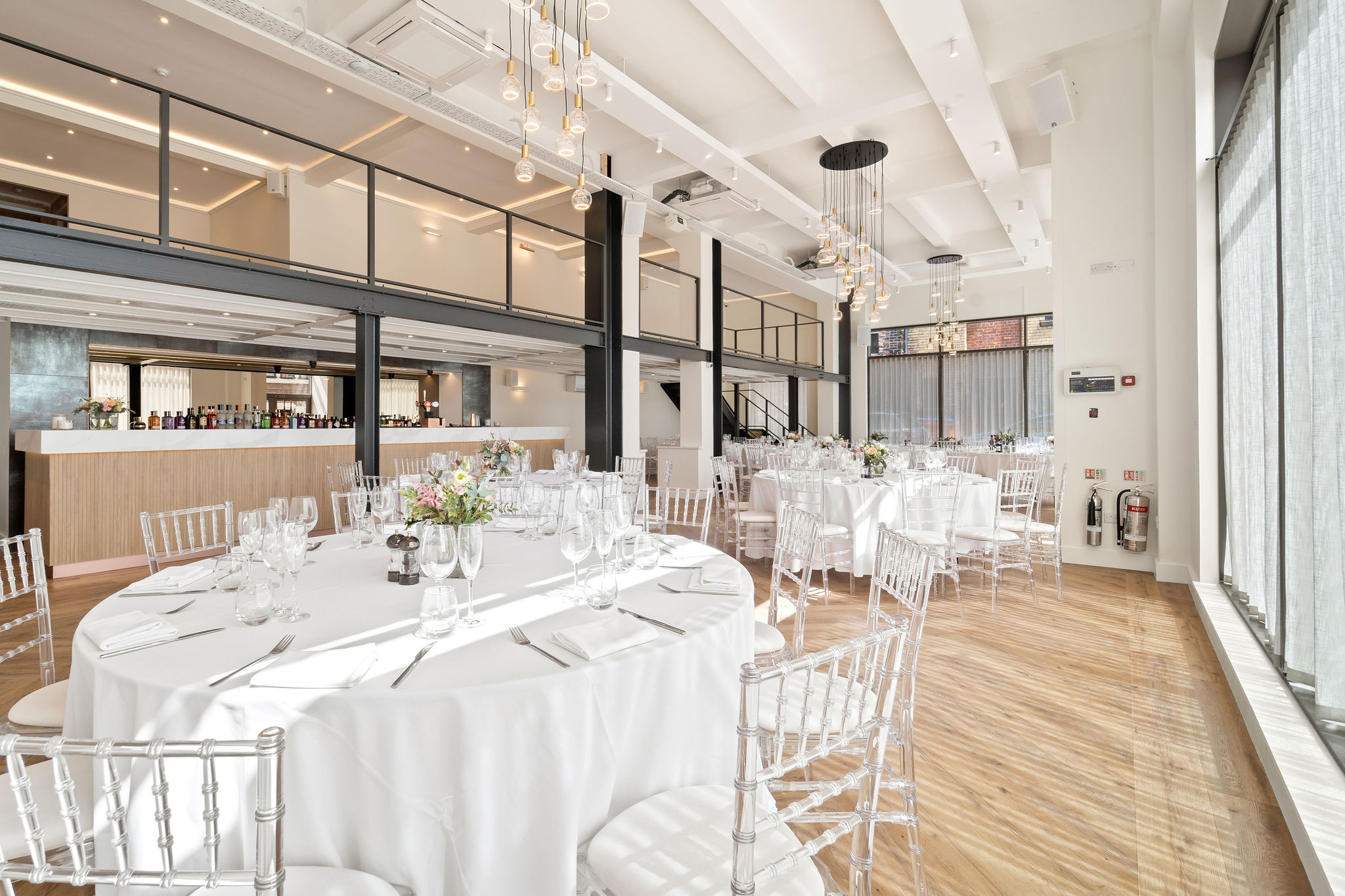 The Clubhouse industrial mezzanine venue for upscale gala dinners and corporate networking events.