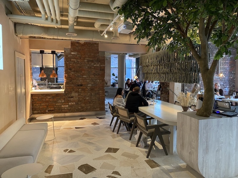 Modern restaurant venue with warm lighting, perfect for meetings and events.