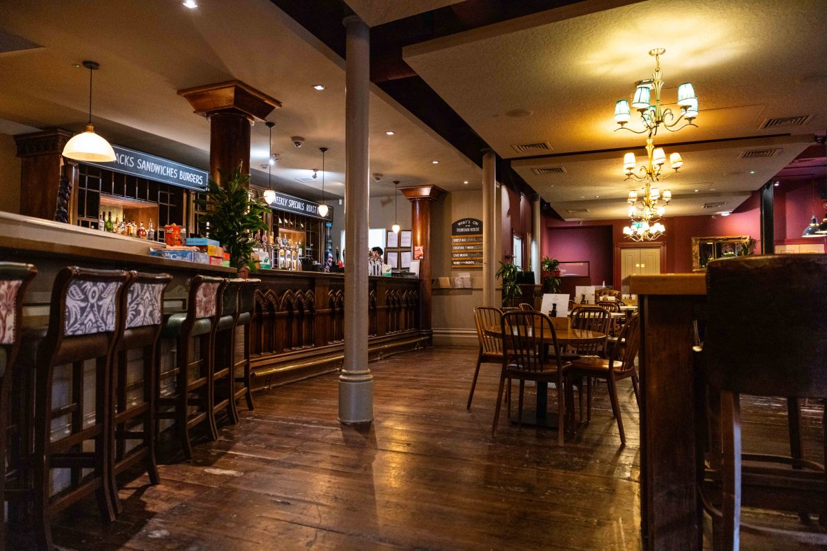 Bar area at The Fountain House, warm atmosphere for meetings and events.