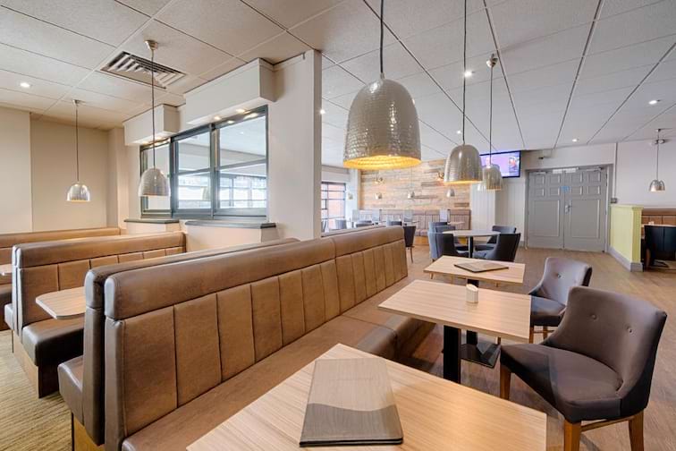 Modern conference room with booth seating for casual meetings and events.