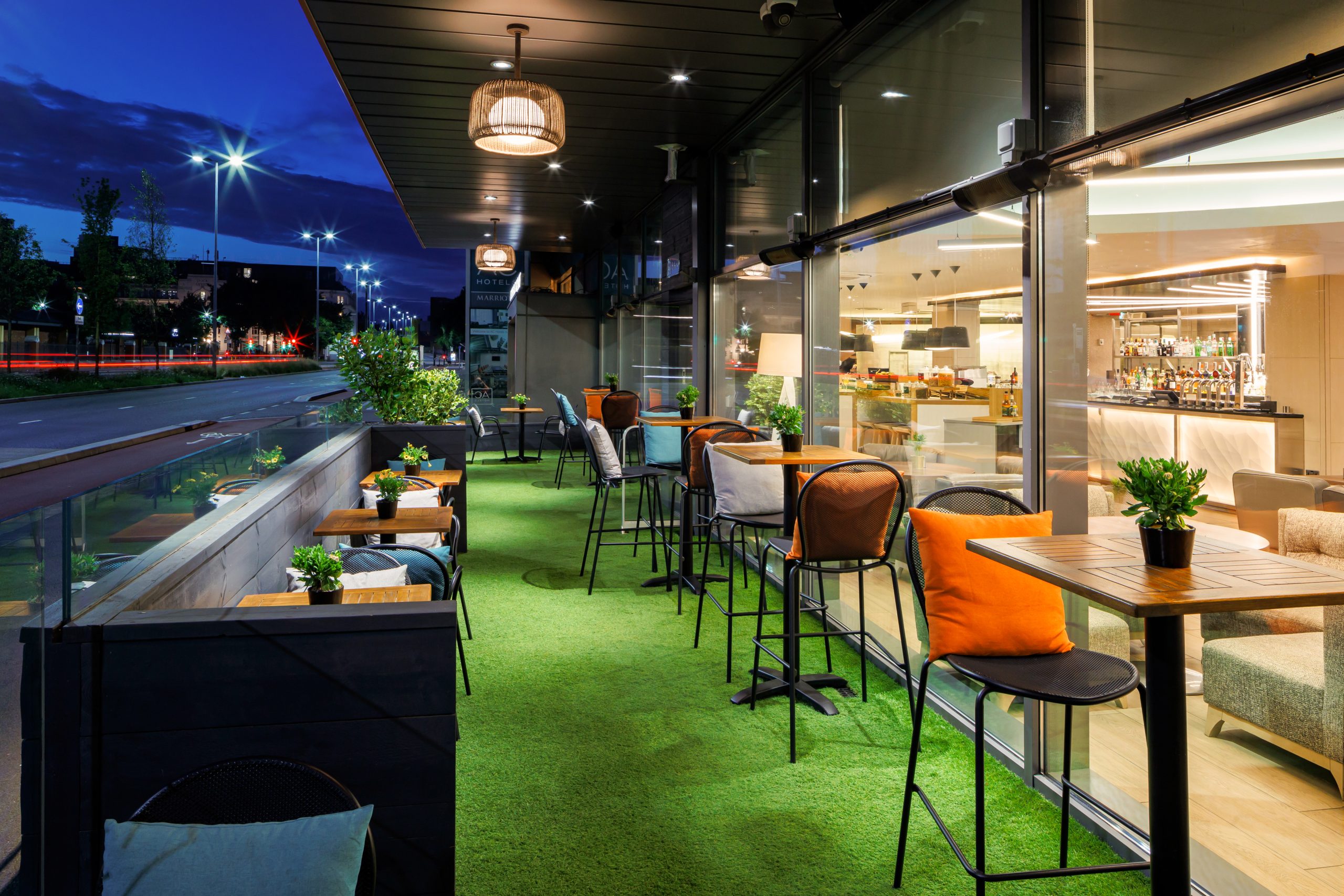 Stylish outdoor terrace at AC Hotel Manchester for networking events and cocktail receptions.