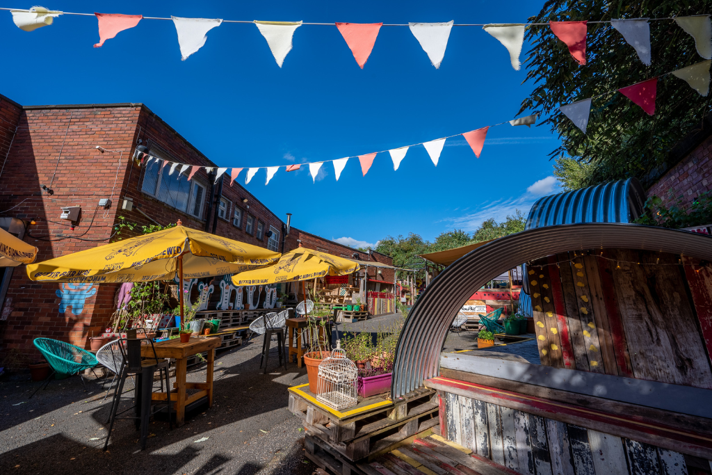 Vibrant outdoor venue at The Hall & CULTPLEX, perfect for summer parties and gatherings.