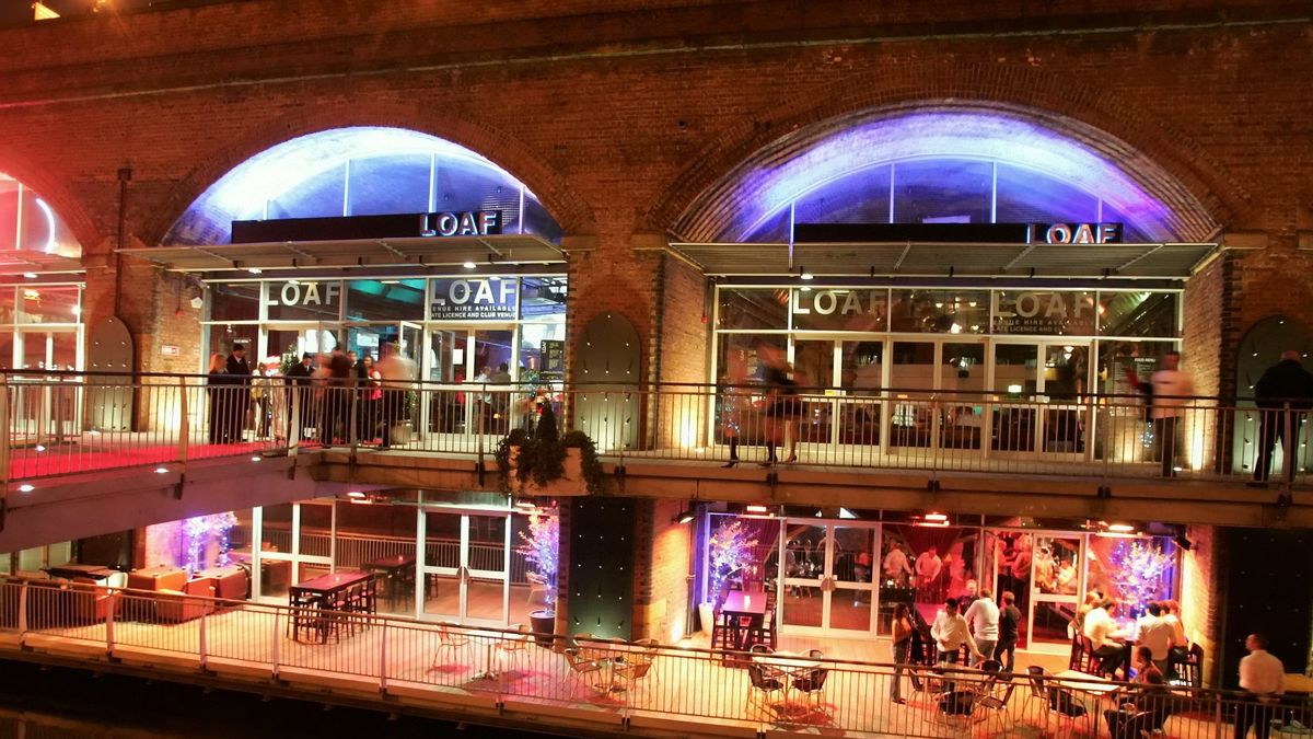 Vibrant Viadux nightclub with illuminated arches, perfect for events and gatherings.