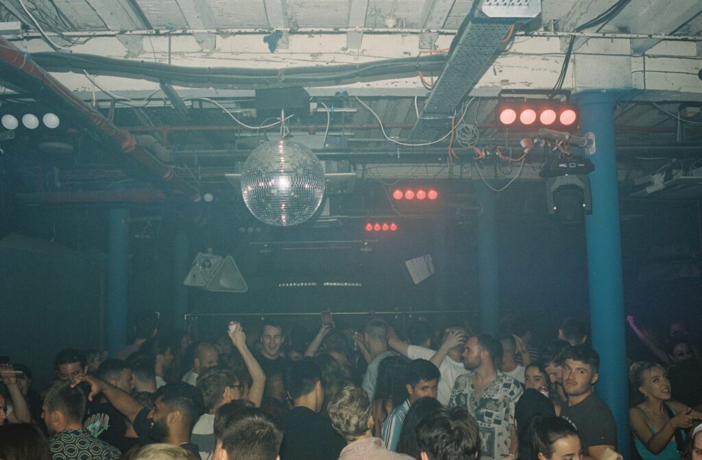 Vibrant nightclub scene in Viadux with disco ball, perfect for parties and events.