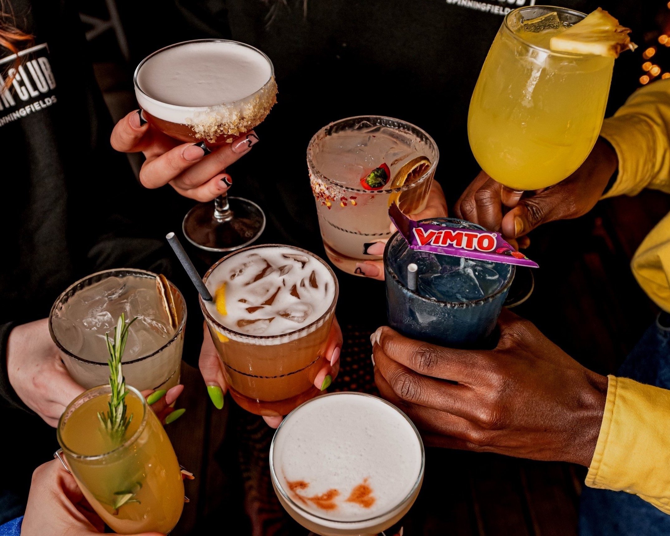 Vibrant cocktails at The Lawn Club, perfect for networking and festive events.