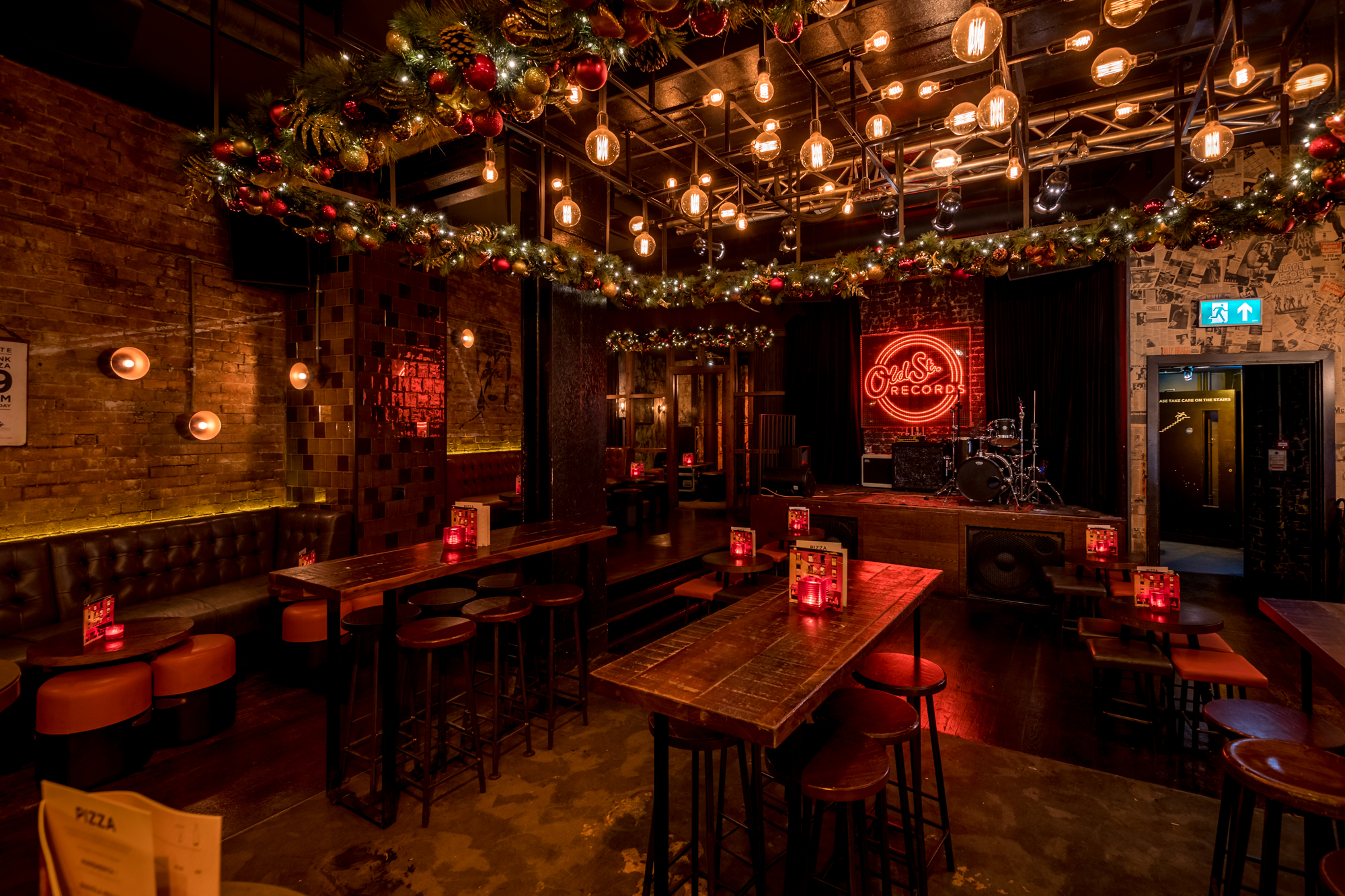 Vibrant event venue with warm lighting, ideal for parties and live performances.