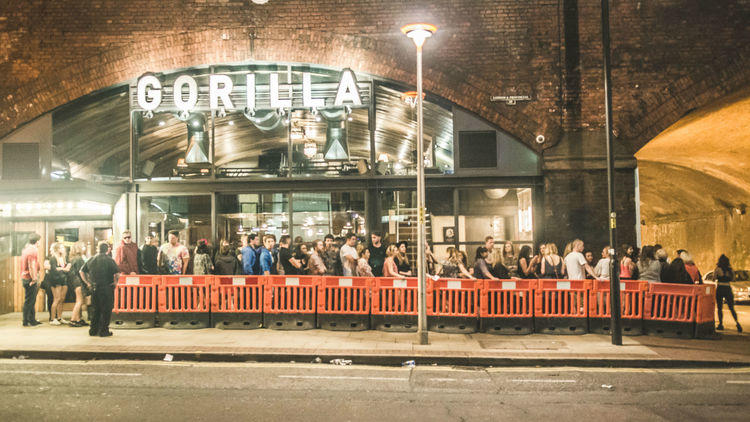 Gorilla venue entrance with attendees in queue for a lively event.