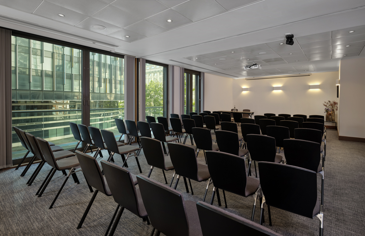 Putney and Westminster Suite meeting room with black chairs, ideal for presentations and workshops.