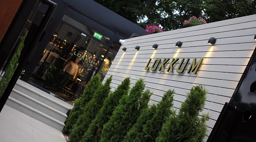 Lokkum Bar & Grill exterior with ambient lighting for evening receptions and private dining events.