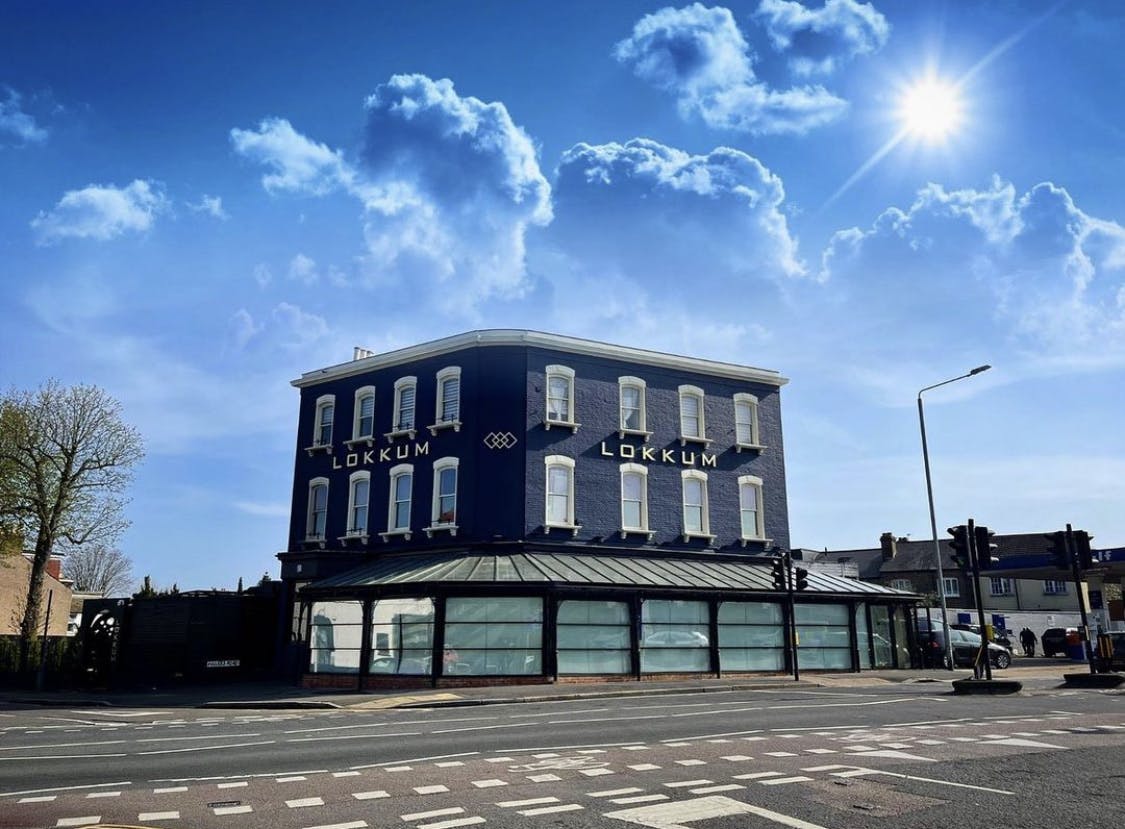 Lokkum Bar & Grill corner venue with large windows, ideal for corporate mixers and private events.