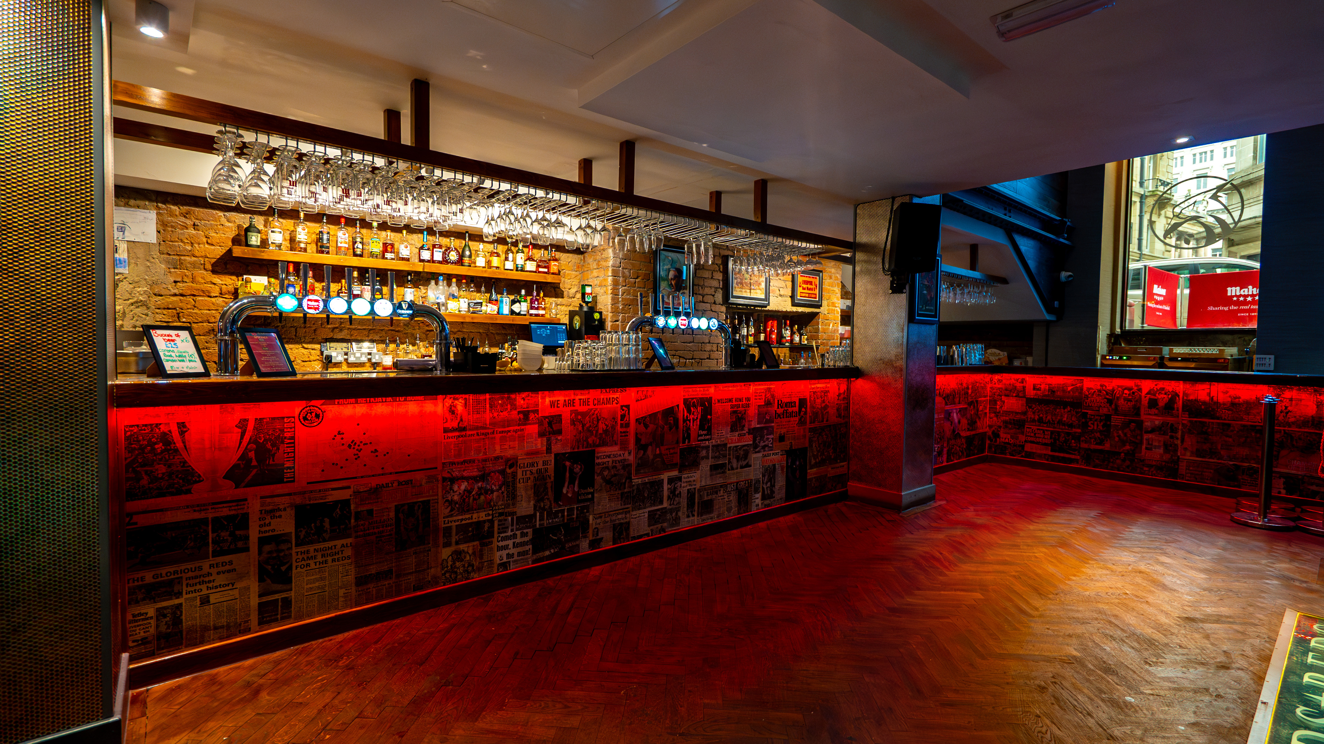 Red LED bar at Reds Liverpool, perfect for evening networking receptions and corporate events.