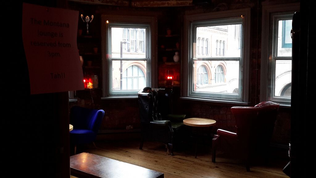 Cozy Montana Lounge in Trof with colorful seating, perfect for networking events.