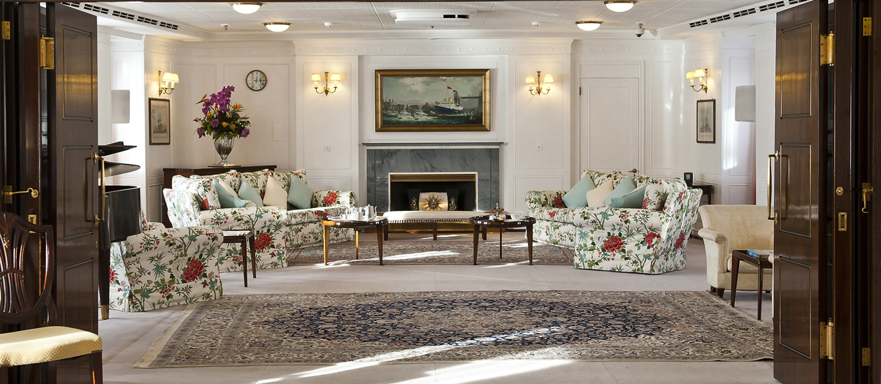 Royal Yacht Britannia State Apartments lounge for VIP board meetings and corporate networking.