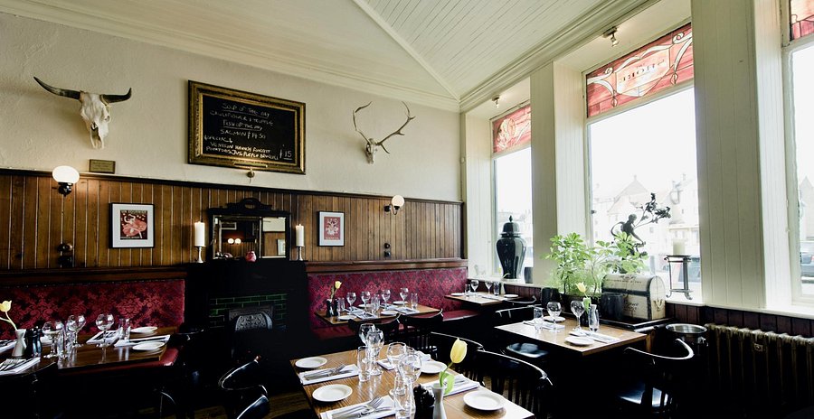 Cozy wood-paneled restaurant for private dining and business networking in Leith.