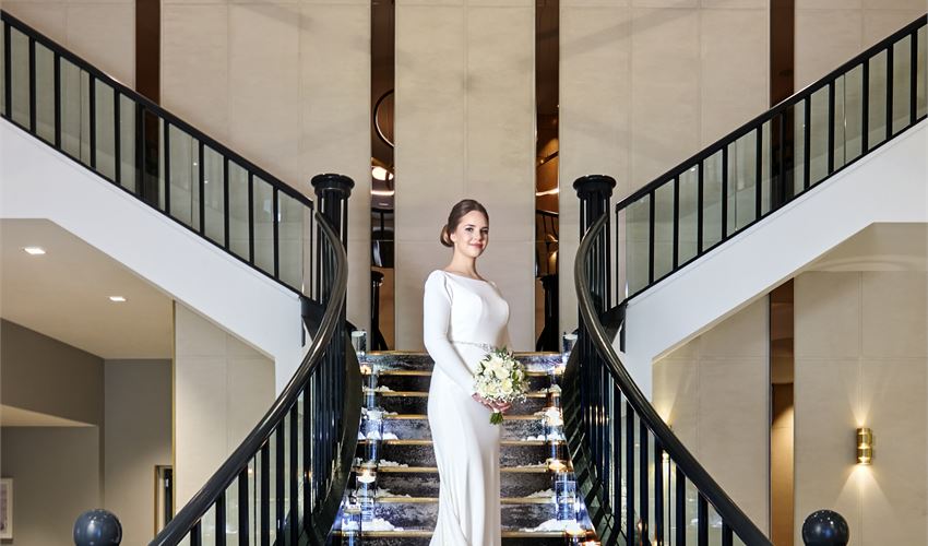 Grand staircase in Hilton Edinburgh Carlton ballroom for luxury wedding or gala venue photography.
