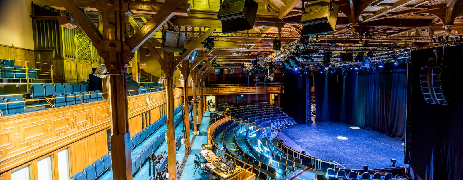Historic Assembly Hall with tiered seating for theater-style plenary sessions and live events.