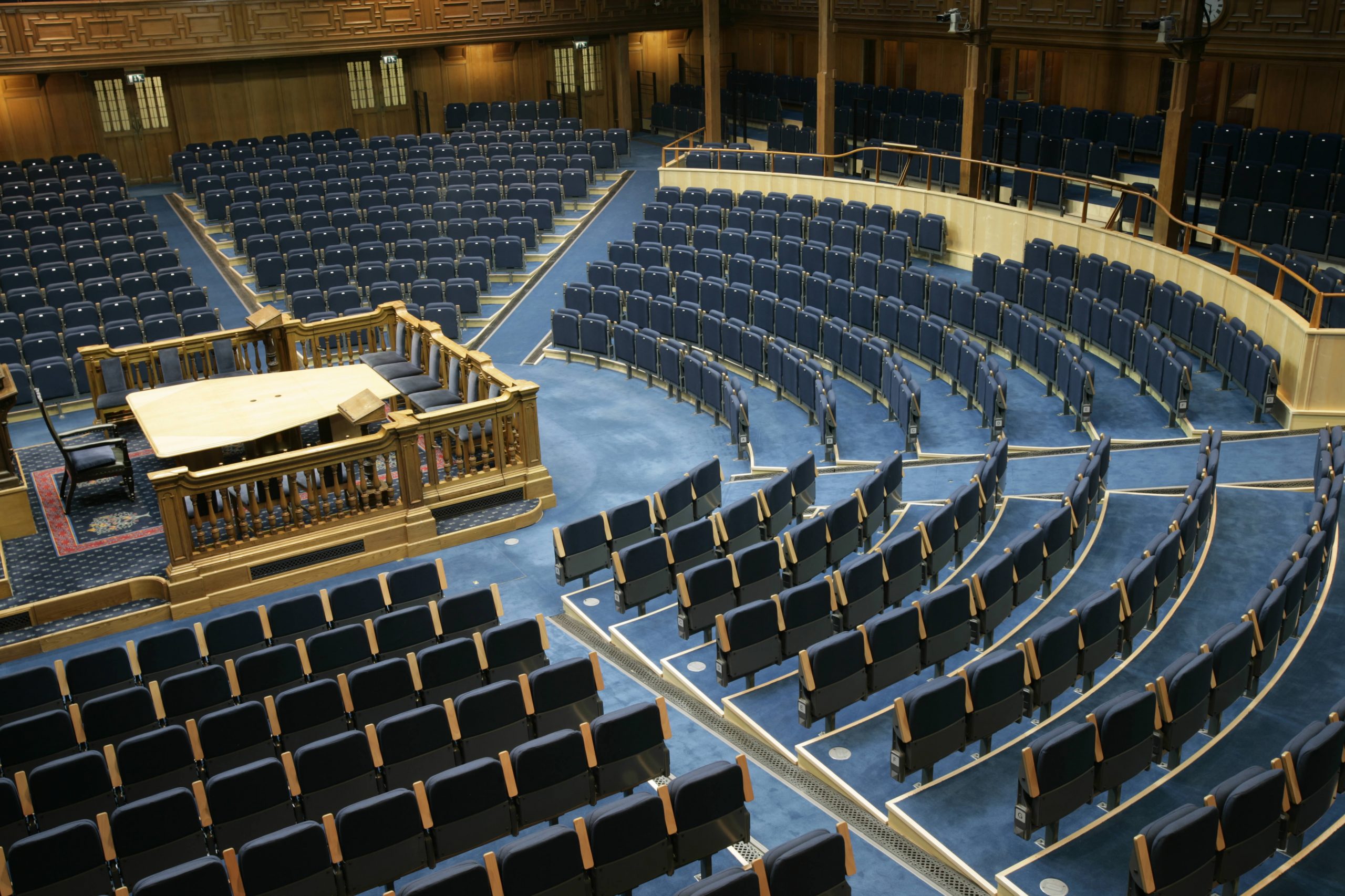 Assembly Hall auditorium with tiered seating for parliamentary debates and legislative panels.