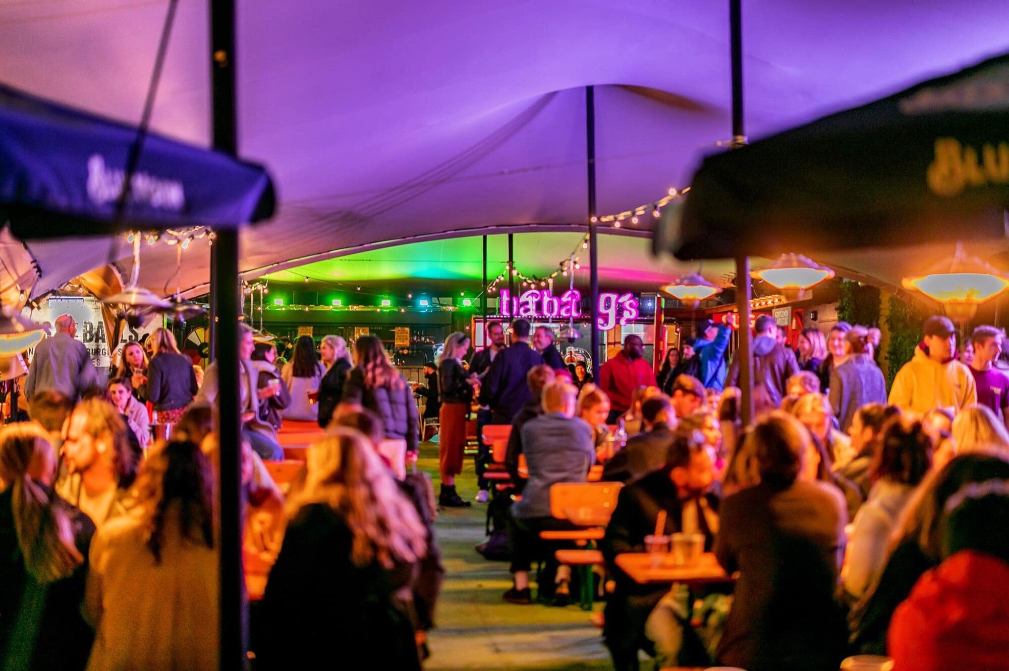 Outdoor lounge at The Curling Club, Vinegar Yard with ambient lighting for corporate events.