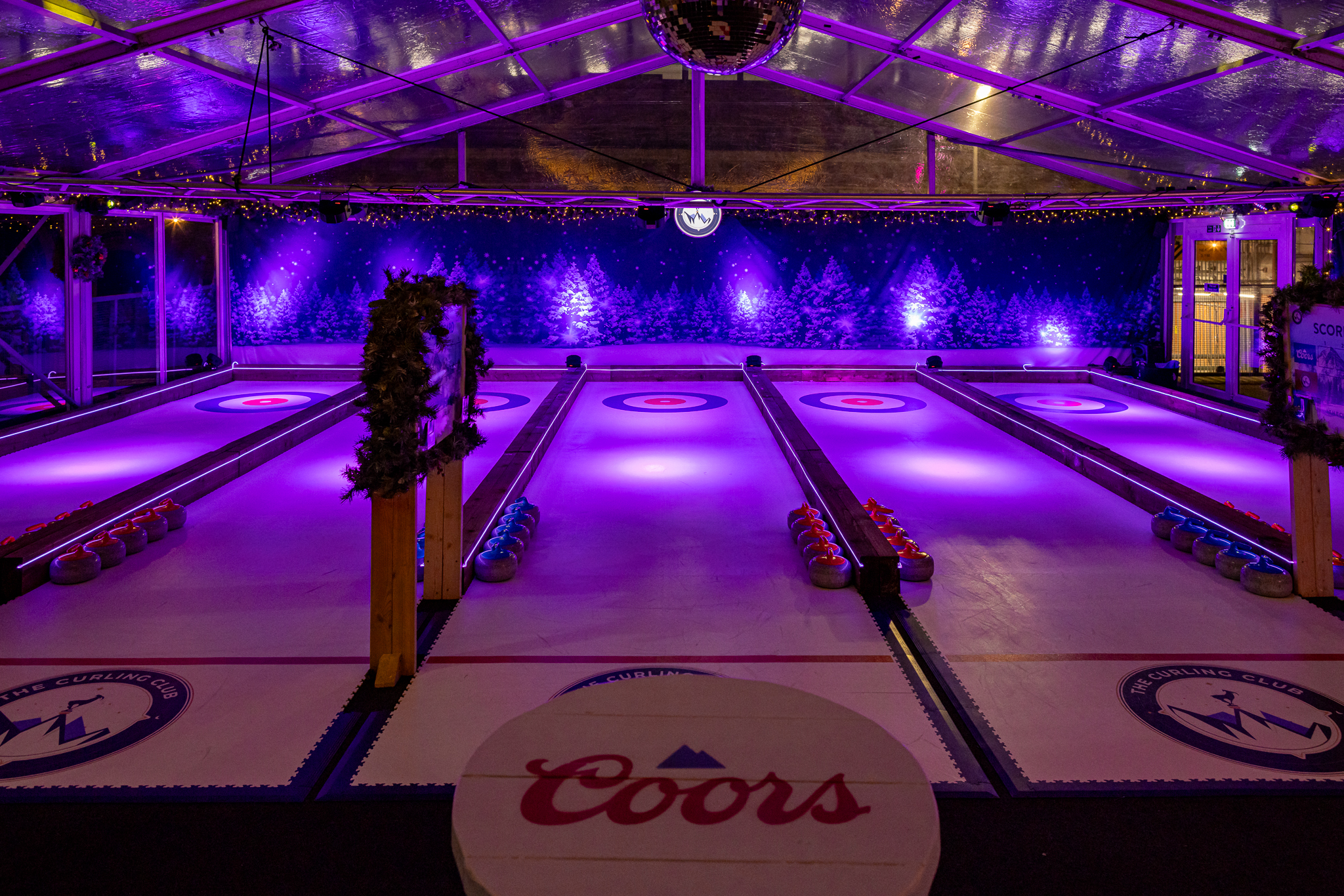 Curling Club pop-up at Vinegar Yard with festive LED lighting for team-building and office events.