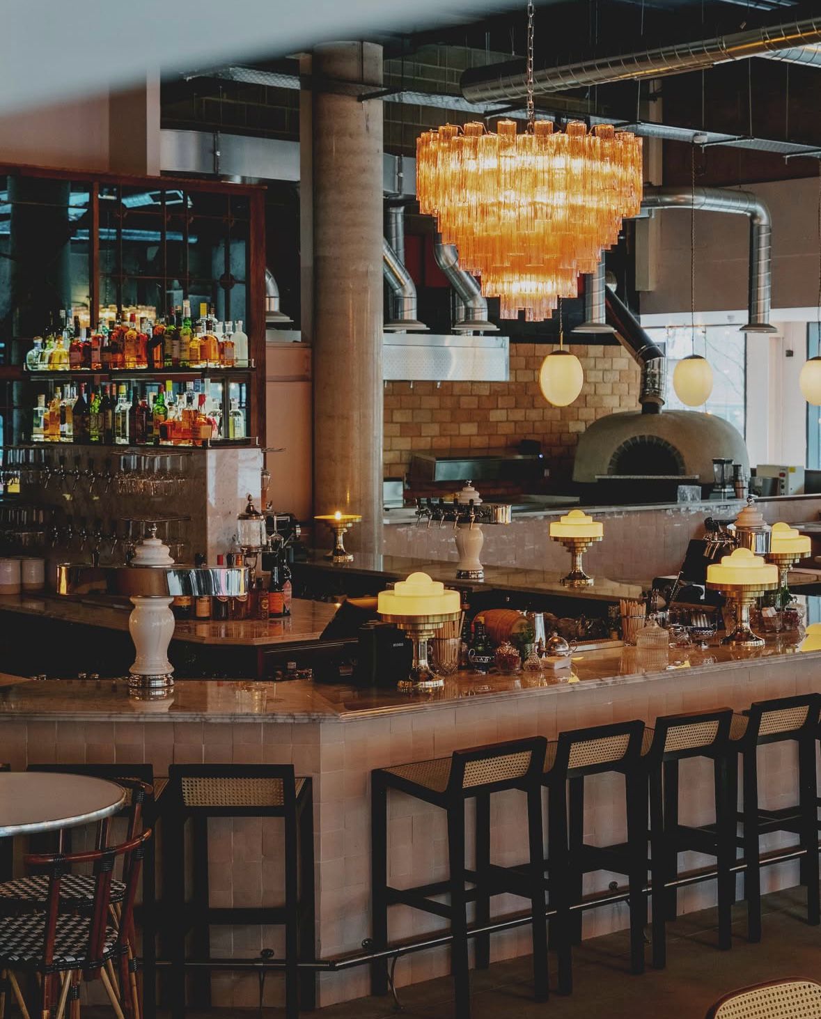 Teatro Hall upscale venue with warm lighting for cocktail receptions and networking events.