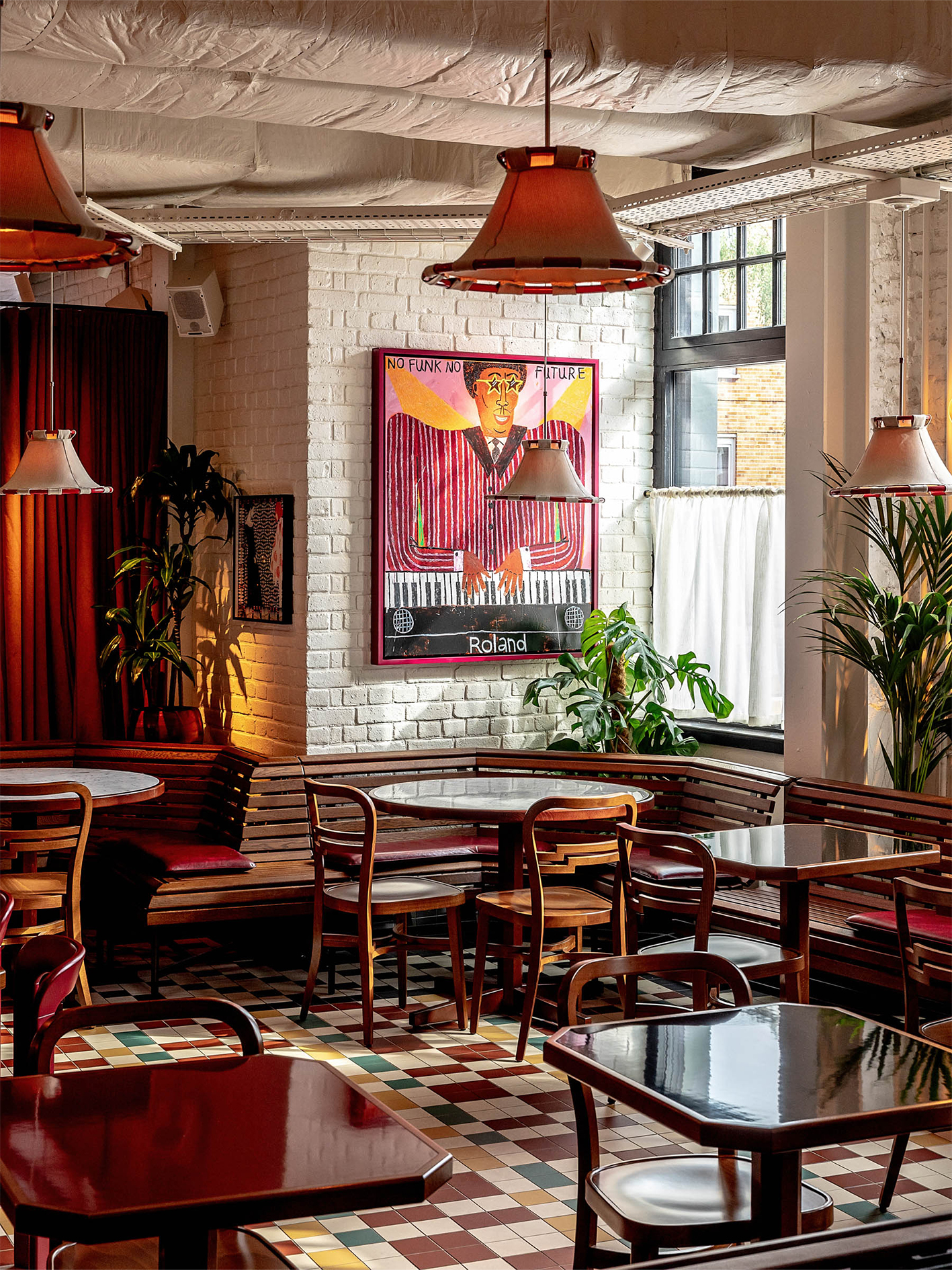 Stylish Cafe KOKO with warm lighting, perfect for networking and meetings.