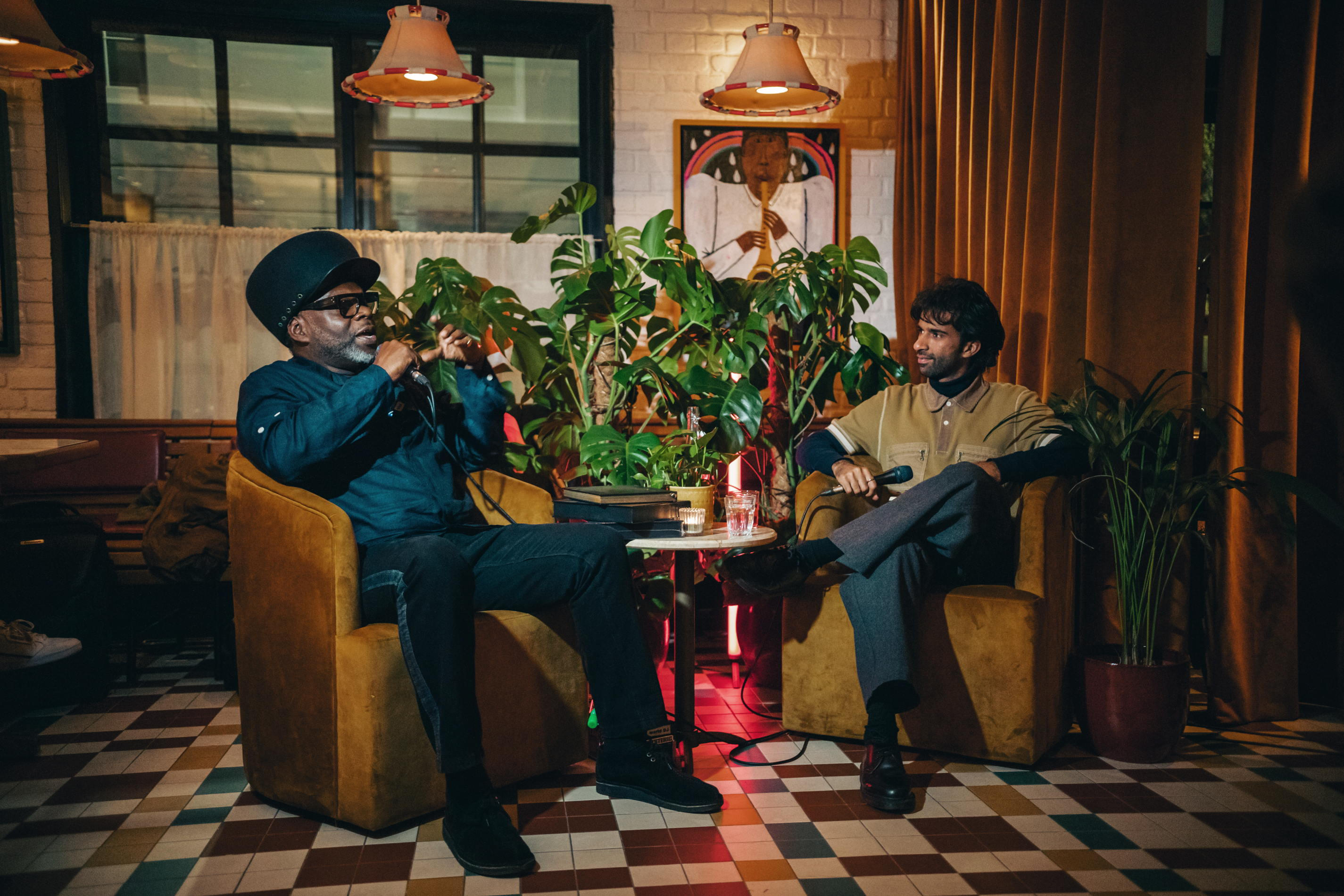 Cozy Cafe KOKO with warm lighting, ideal for panel discussions and networking events.