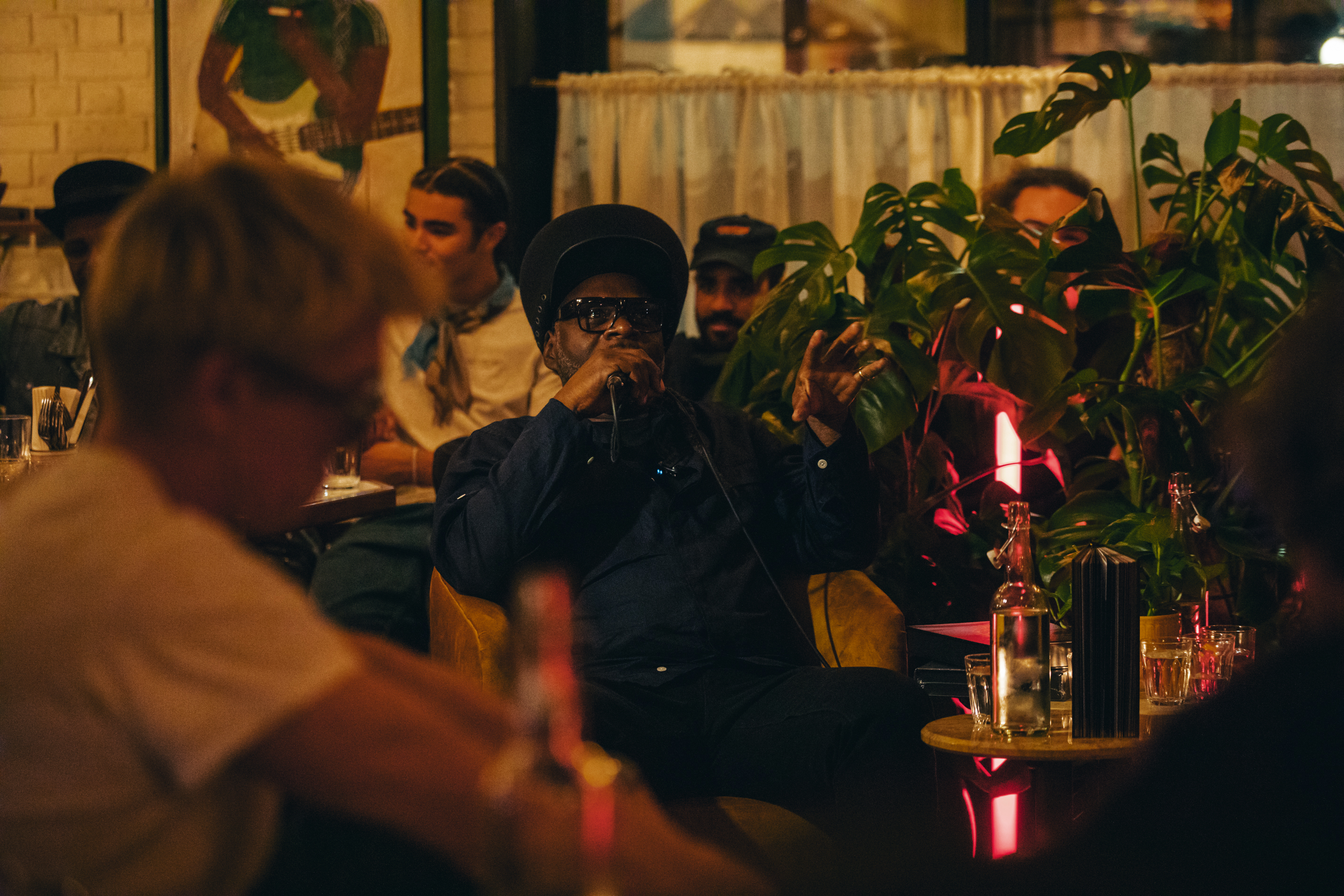 Vibrant Cafe KOKO with casual seating, ideal for networking events and live performances.