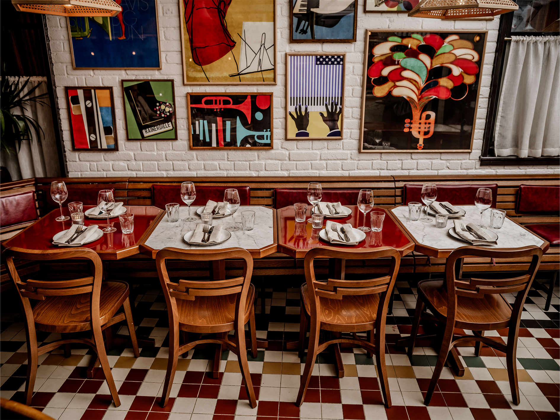 Vibrant Cafe KOKO dining space with eclectic artwork for intimate gatherings and events.