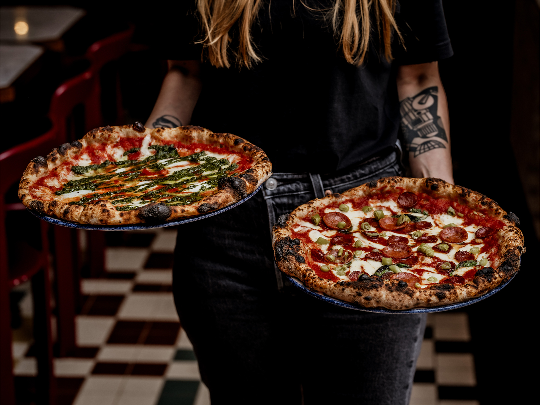 Artisanal pizzas at Cafe KOKO, showcasing quality catering for events and gatherings.