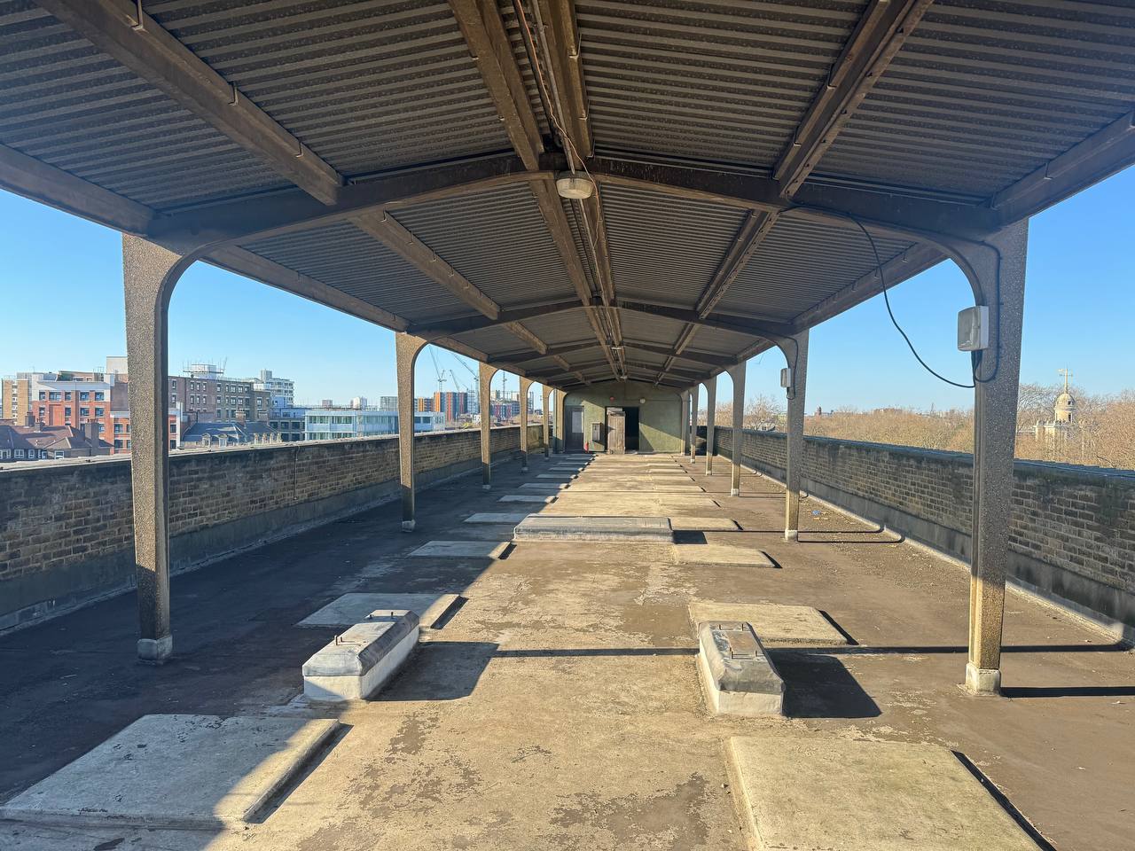 East London Rooftop with urban backdrop, perfect for events and workshops.