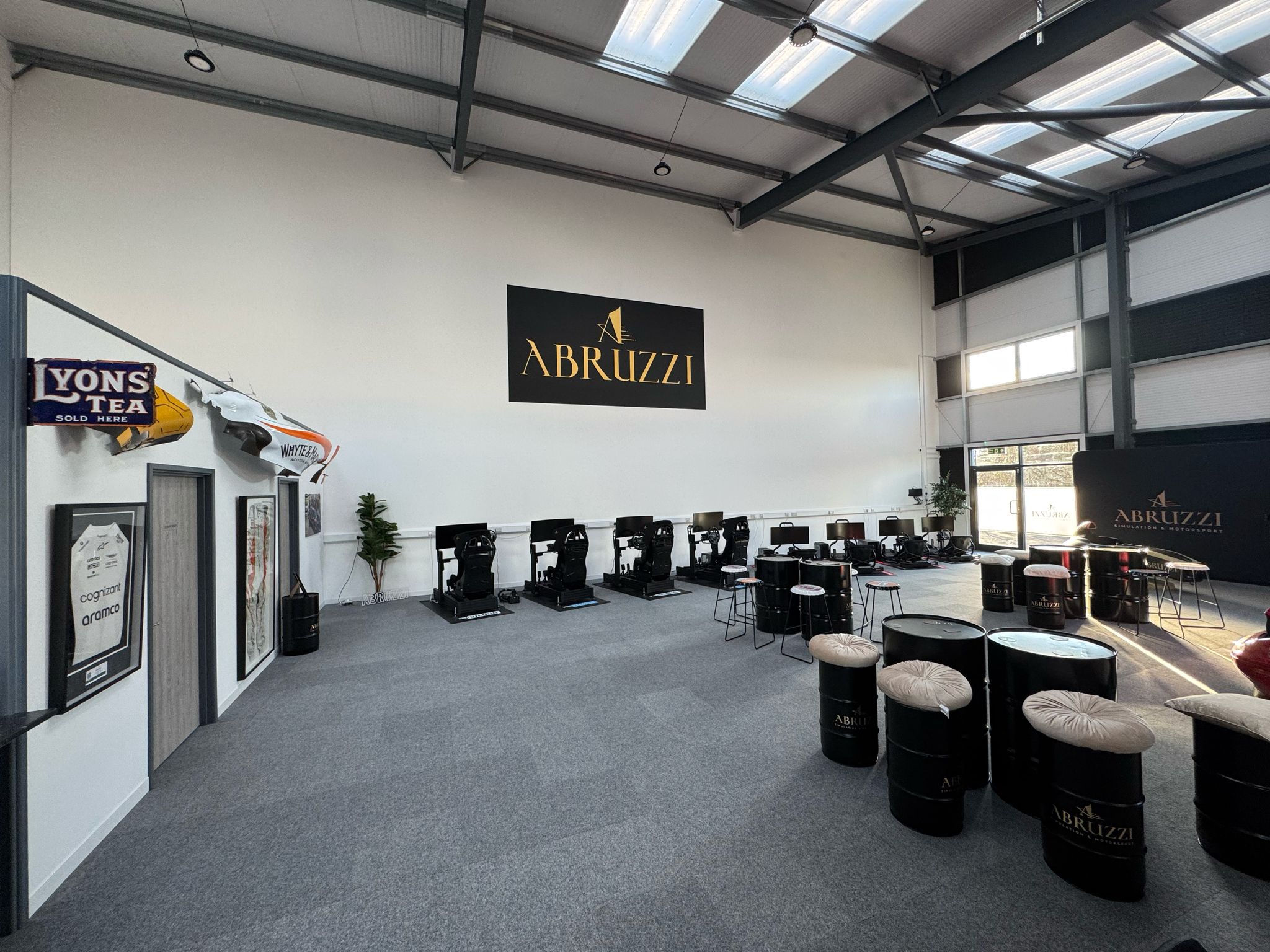 Abruzzi Sim Racing showroom with racing simulators for corporate events and brand activations.