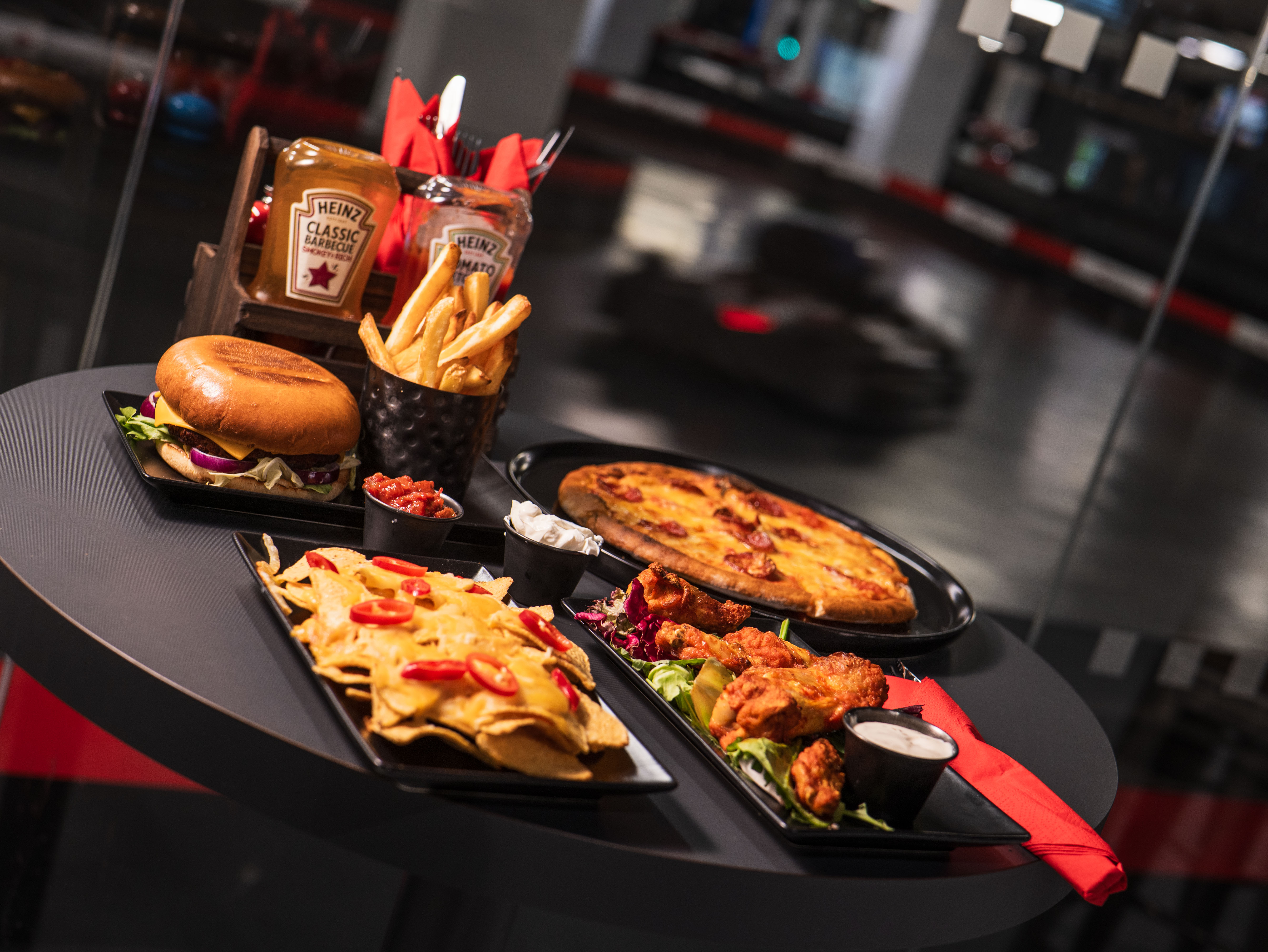 Casual dining spread at K1 Speed Canary Wharf for corporate events and team-building.
