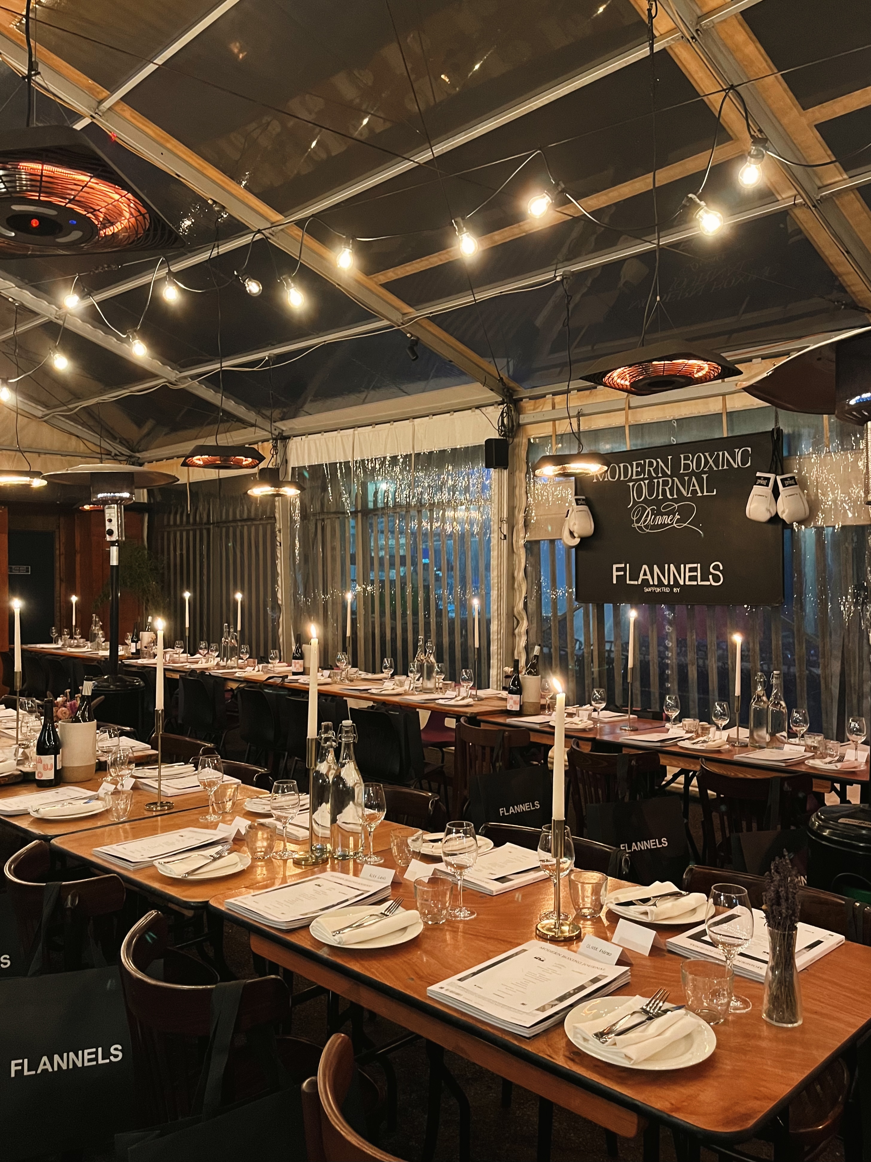 Elegant dining setup in a tent at Private Hire Brat x Climpson's Arch for corporate events.