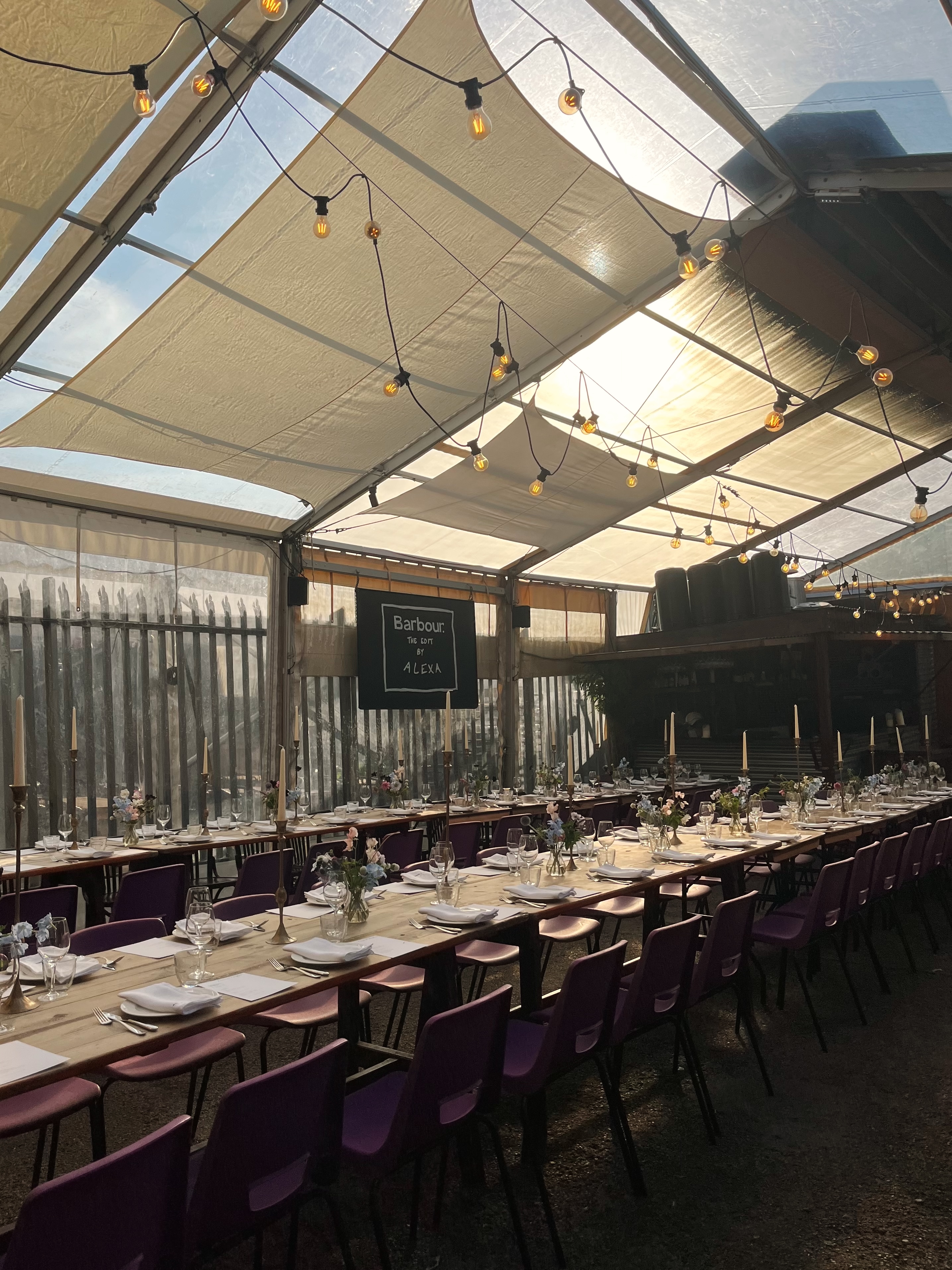 Private Hire event at Brat x Climpson's Arch, featuring elegant dining setup under tent.