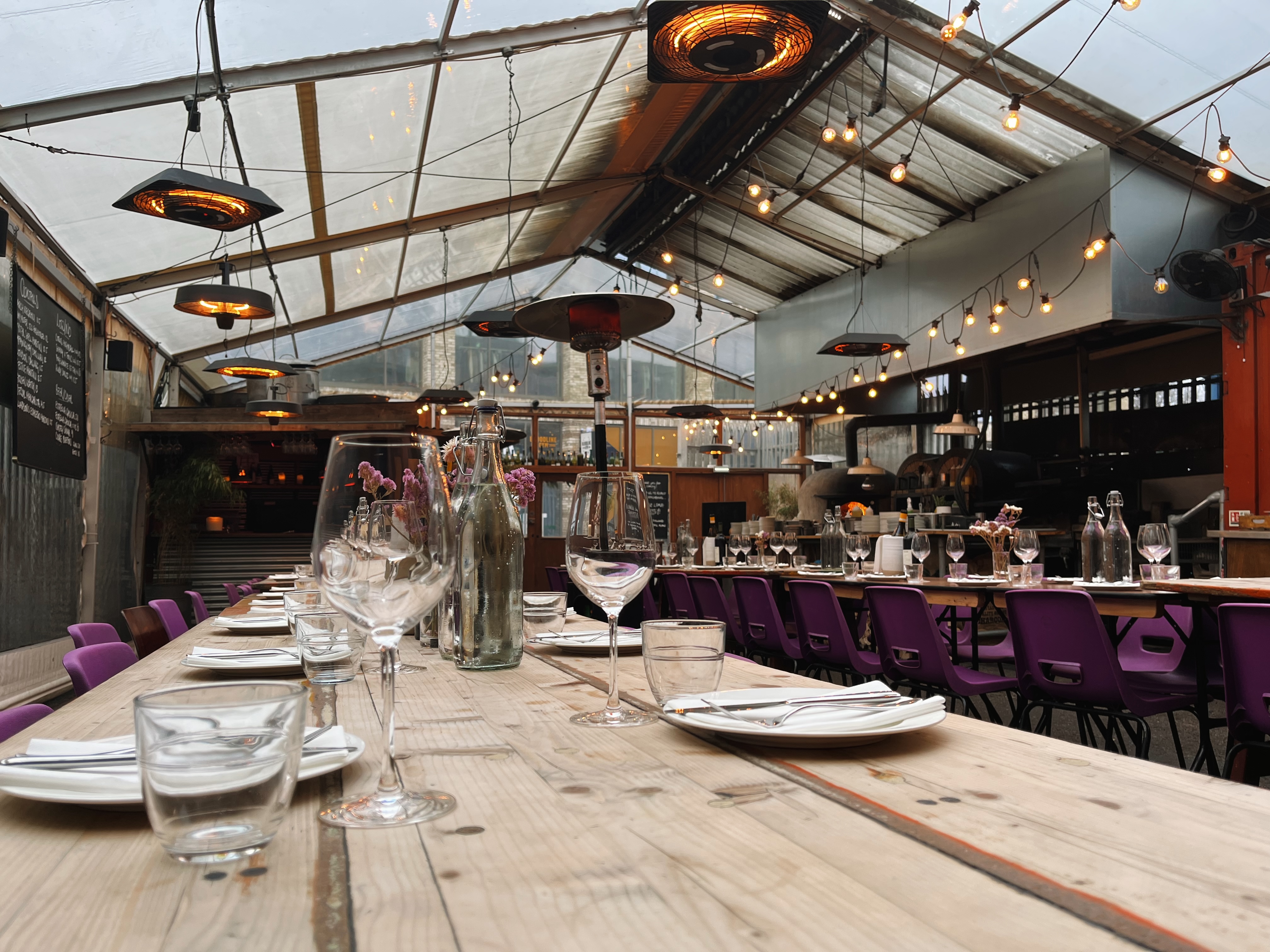 Private Hire venue with stylish decor, elegant dining setup for events in Brat x Climpson's Arch.