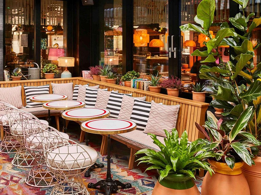 Stylish outdoor seating at Garden Bar, Mama Shelter London for networking events.